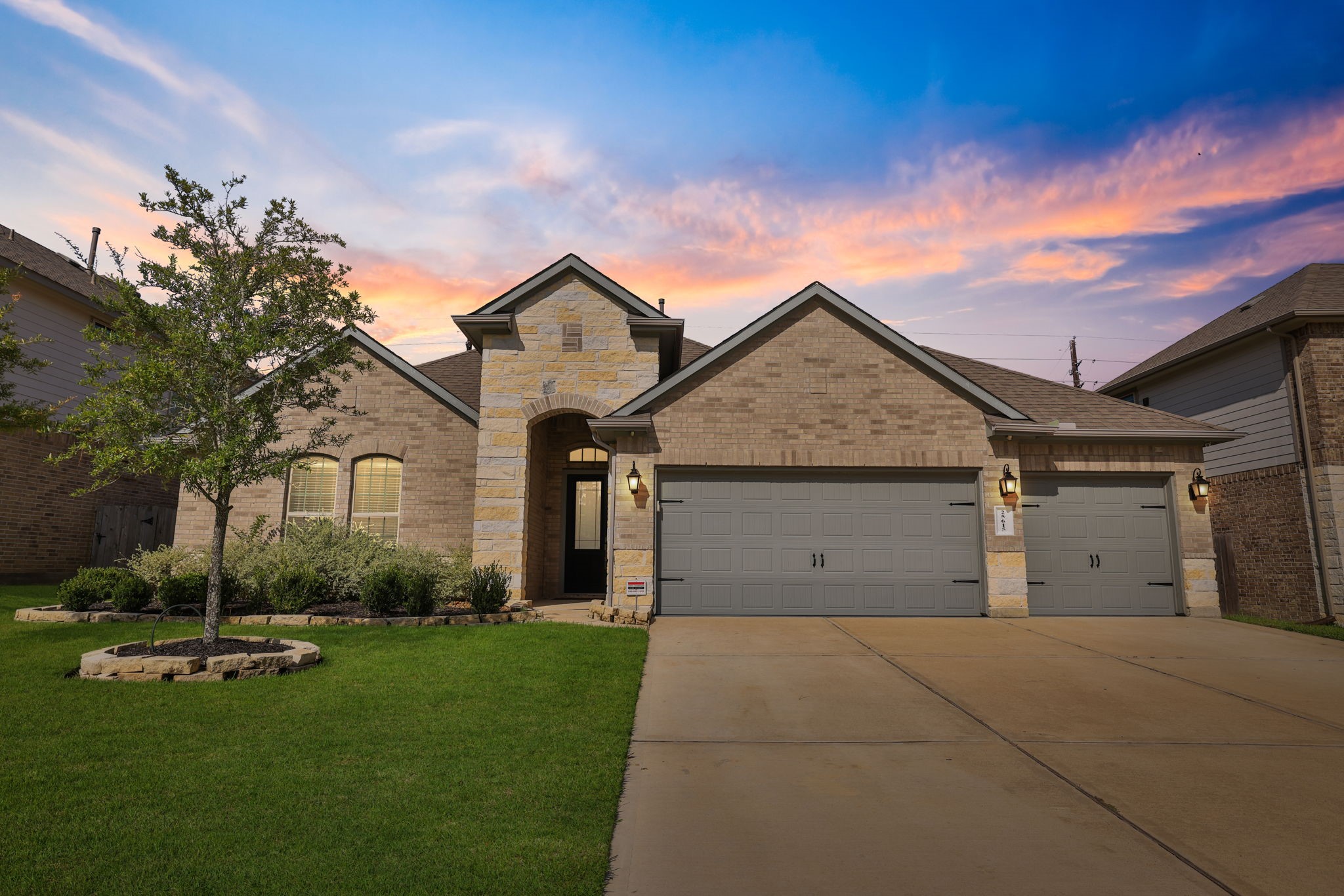 Nice all brick one story has a 3 car garage