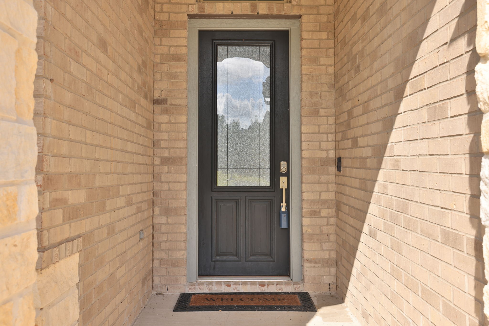 The covered front entry is convenient with 8' front door