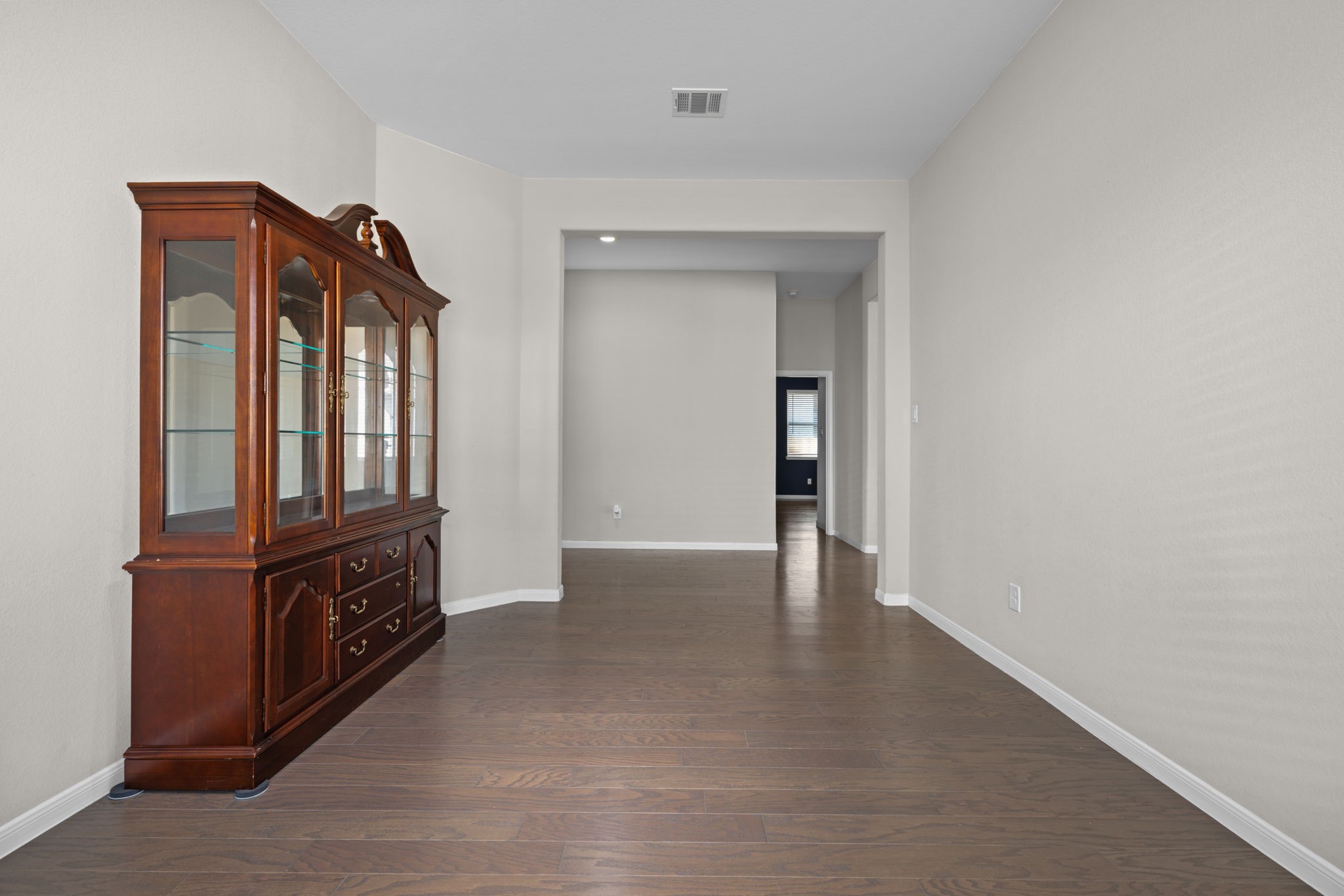 The view in the dining room looking out towards the walk way. There's another entrance directly into the kitchen.