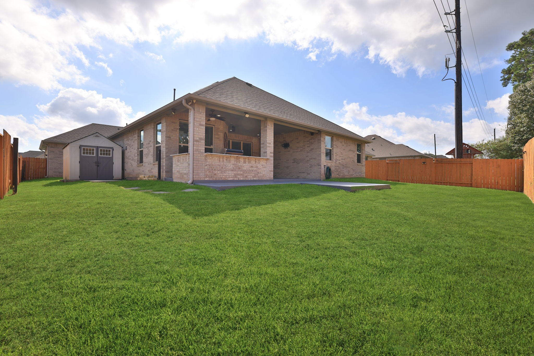 Lots of room for playing and enjoying this private backyard with full fence