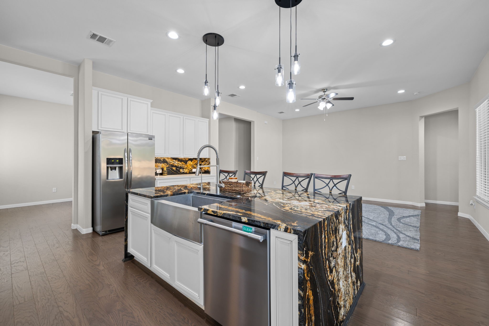 The pendant lights add a nice decorative touch while still giving soft lighting along with all the recessed lights