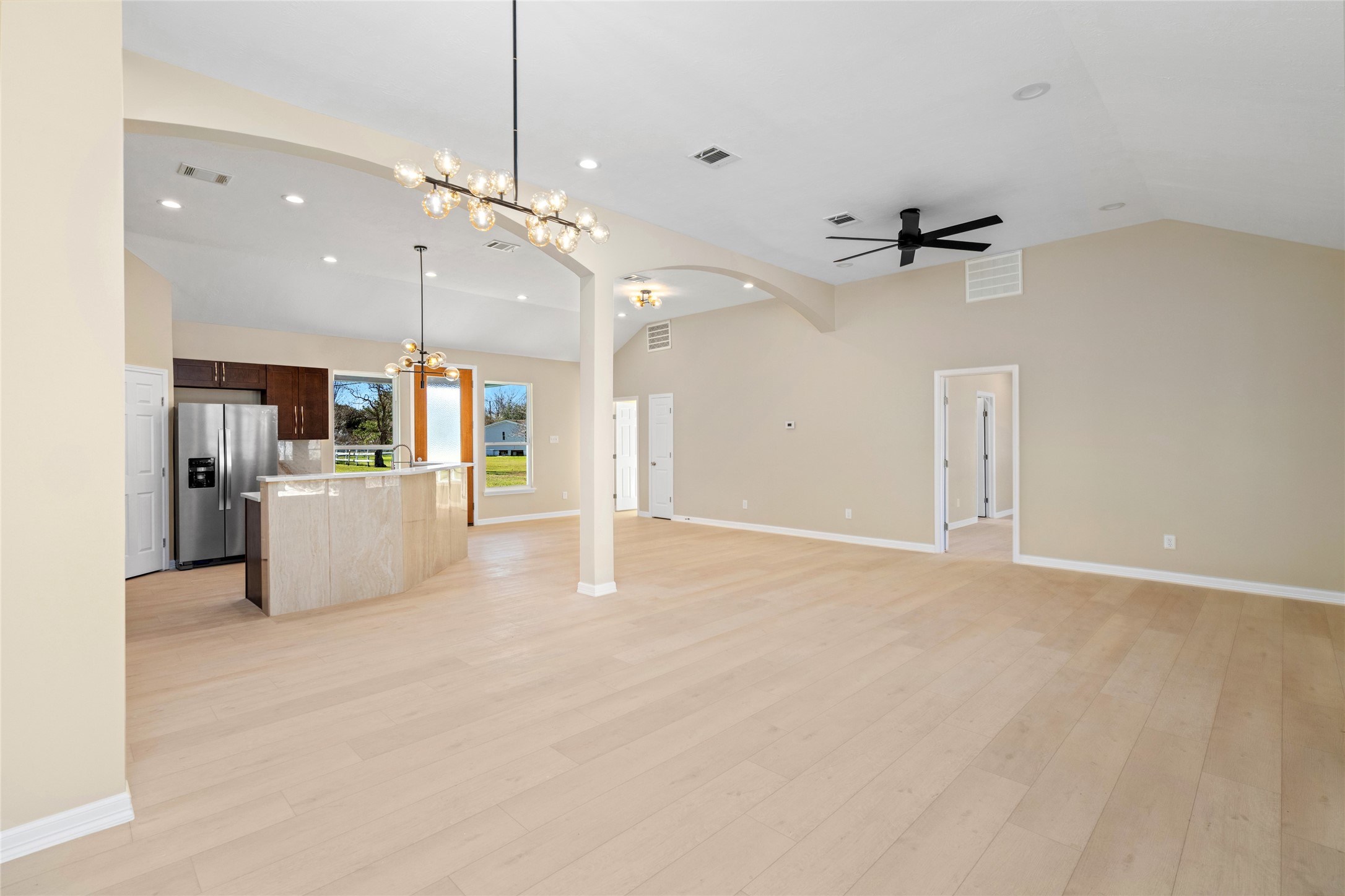 A welcoming close-up of the
front door reveals highquality finishes, stylish
lighting, and an inviting
entryway that sets the tone
for the luxury inside.