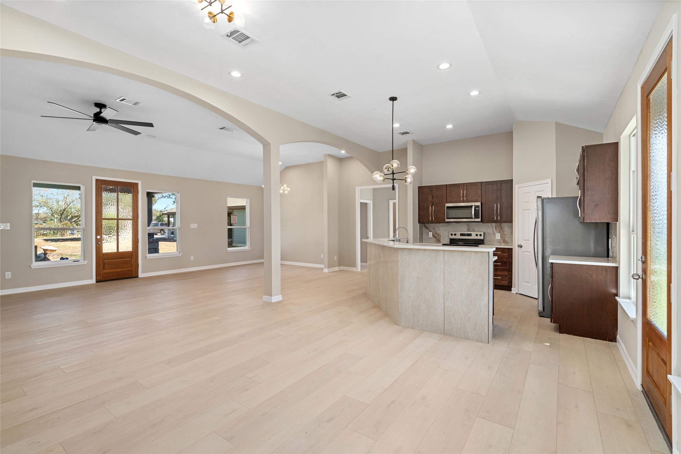 From this perspective, notice
the perfect blend of form and
function: open living, dining,
and kitchen areas ideal for
family gatherings or hosting
friends.
