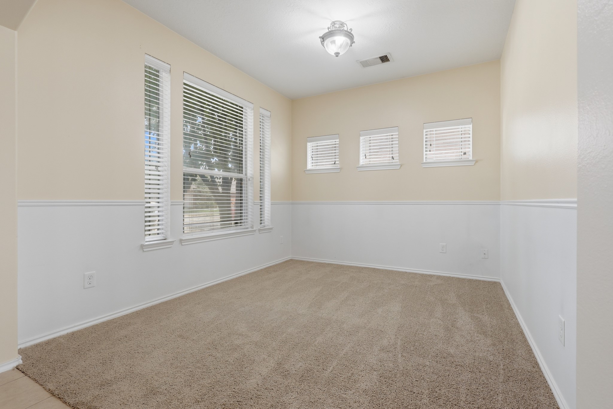 Flex room right to your left as you walk in. This could be a Formal Dining or Home Office