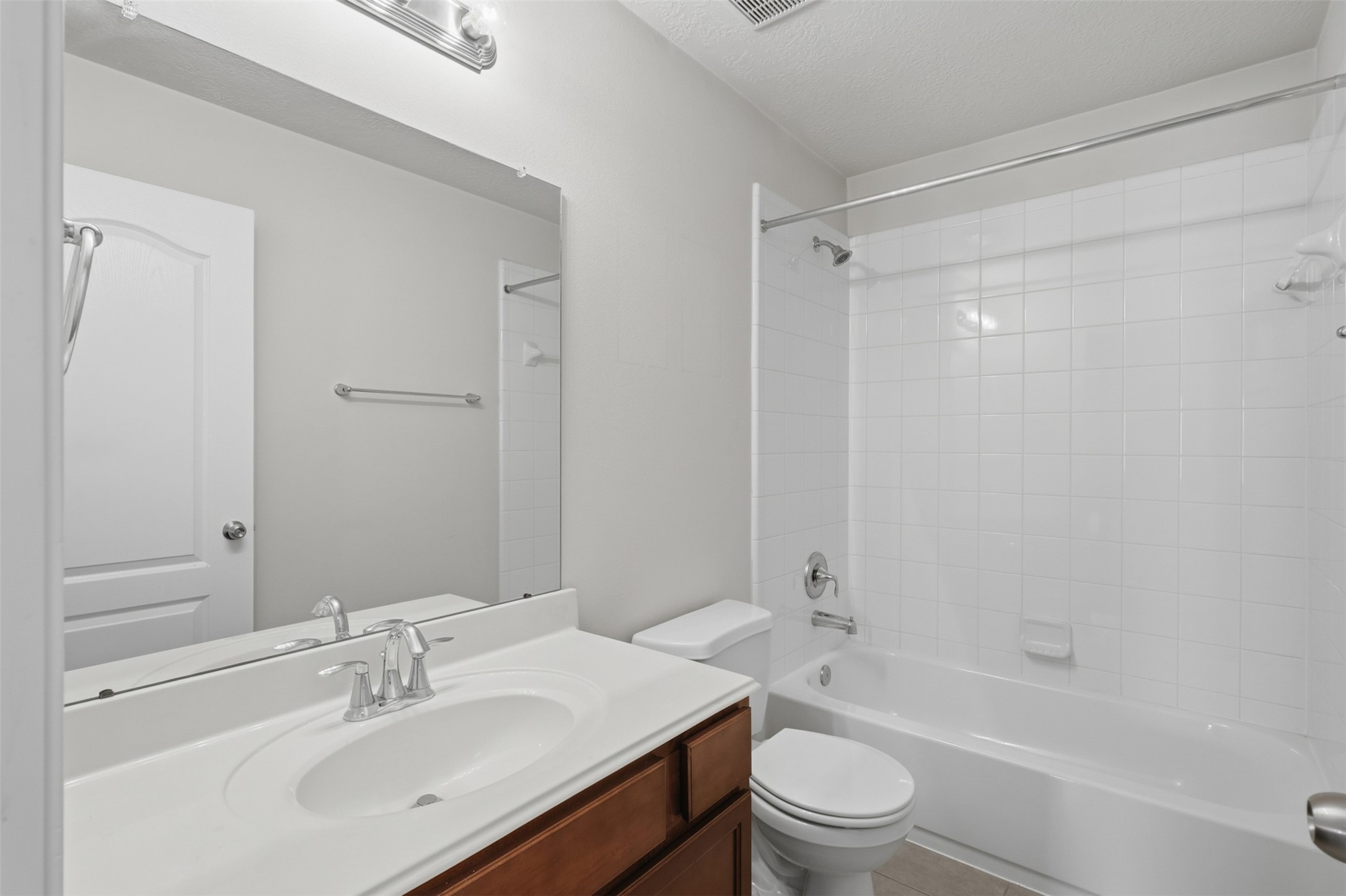 Secondary Bathroom with a tub/shower combo!