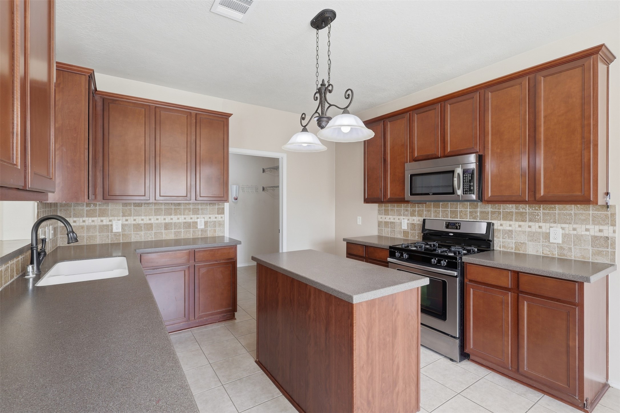 AMPLE cabinetry and storage space