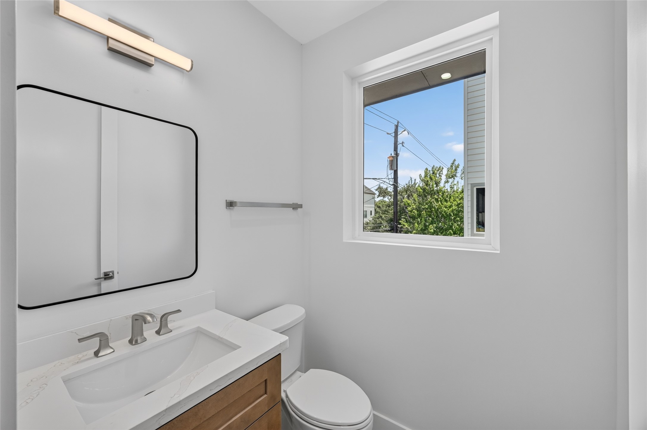 Half bathroom located on the second floor keeping all secondary bedrooms and bathrooms private