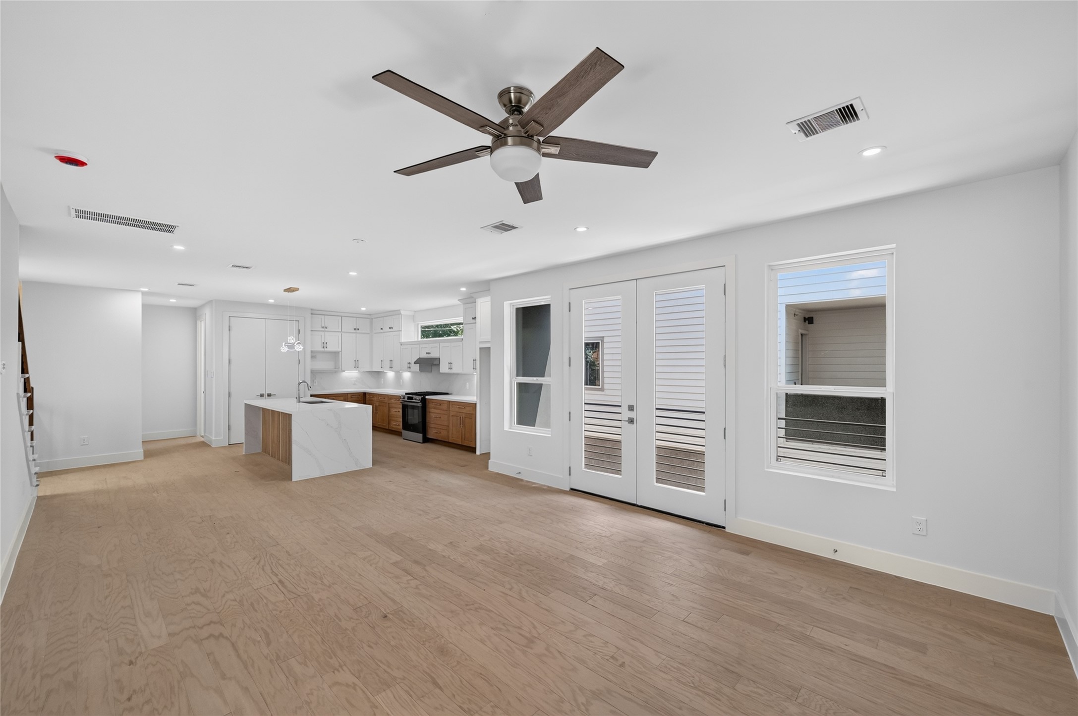 Another view of the open concept that leads to the patio sliding doors