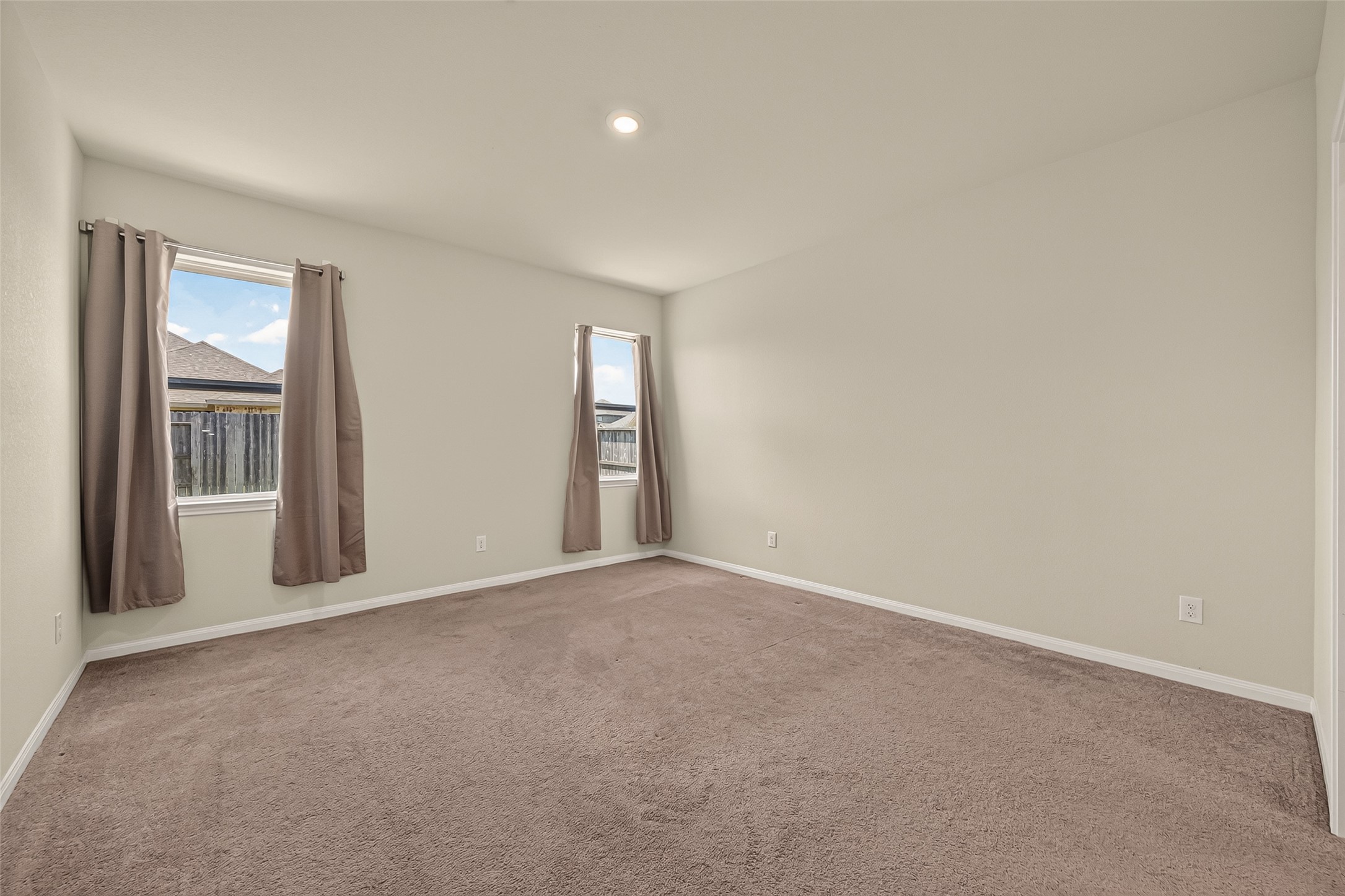 Primary room is located at back of home.
