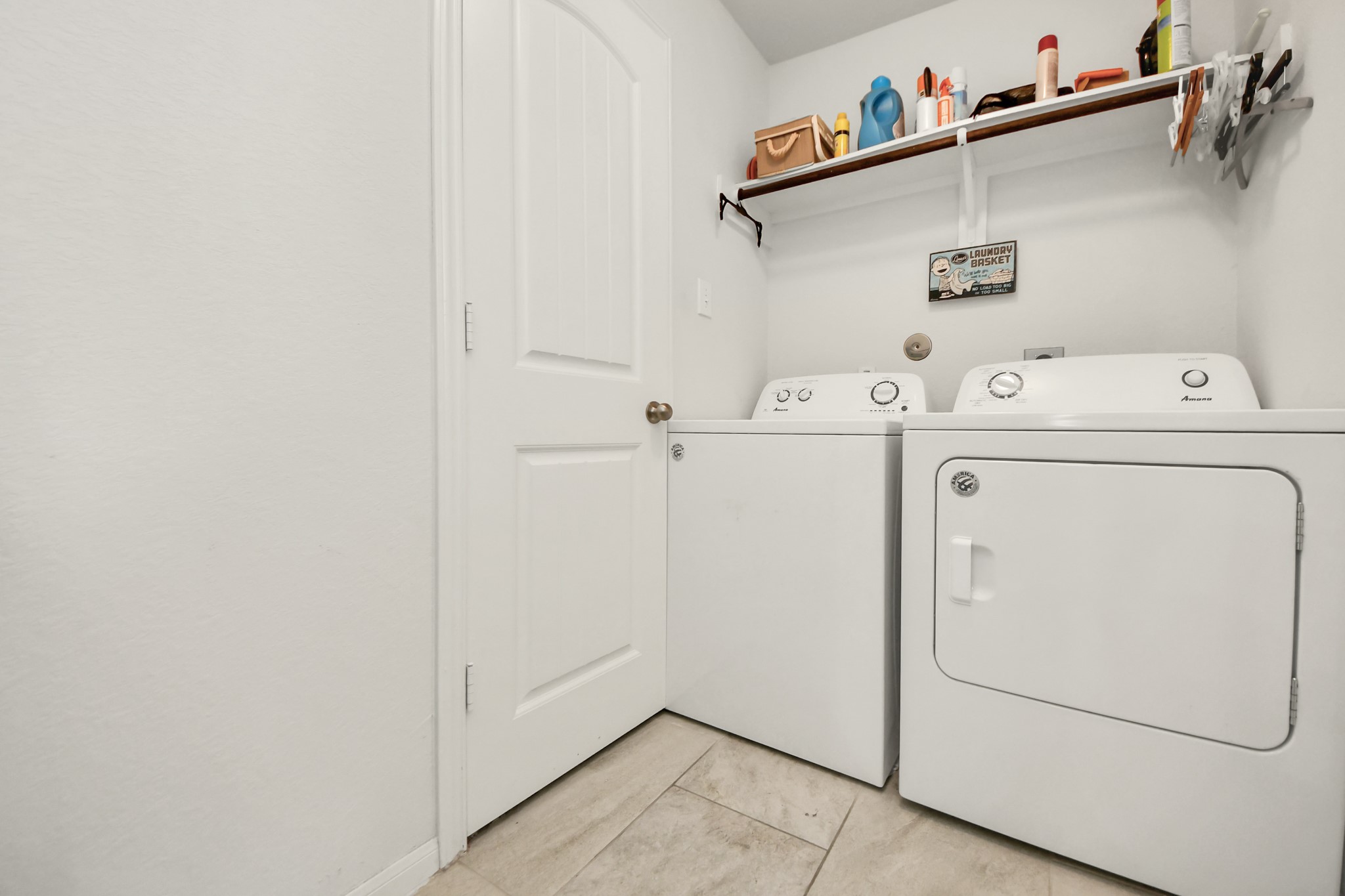 Laundry room with direct access to primary closet