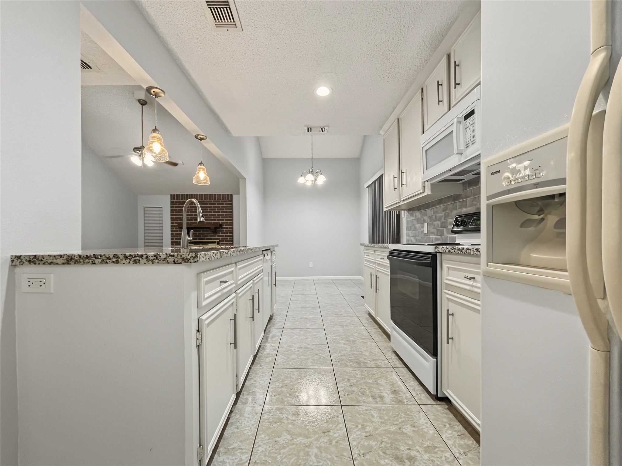 View from the laundry room to the kitchen.