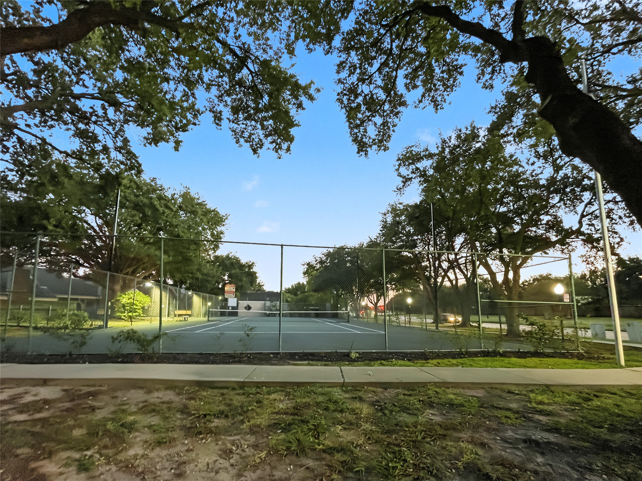 View of one of the tennis courts in the subdivision. View of one of the tennis courts in the subdivision.