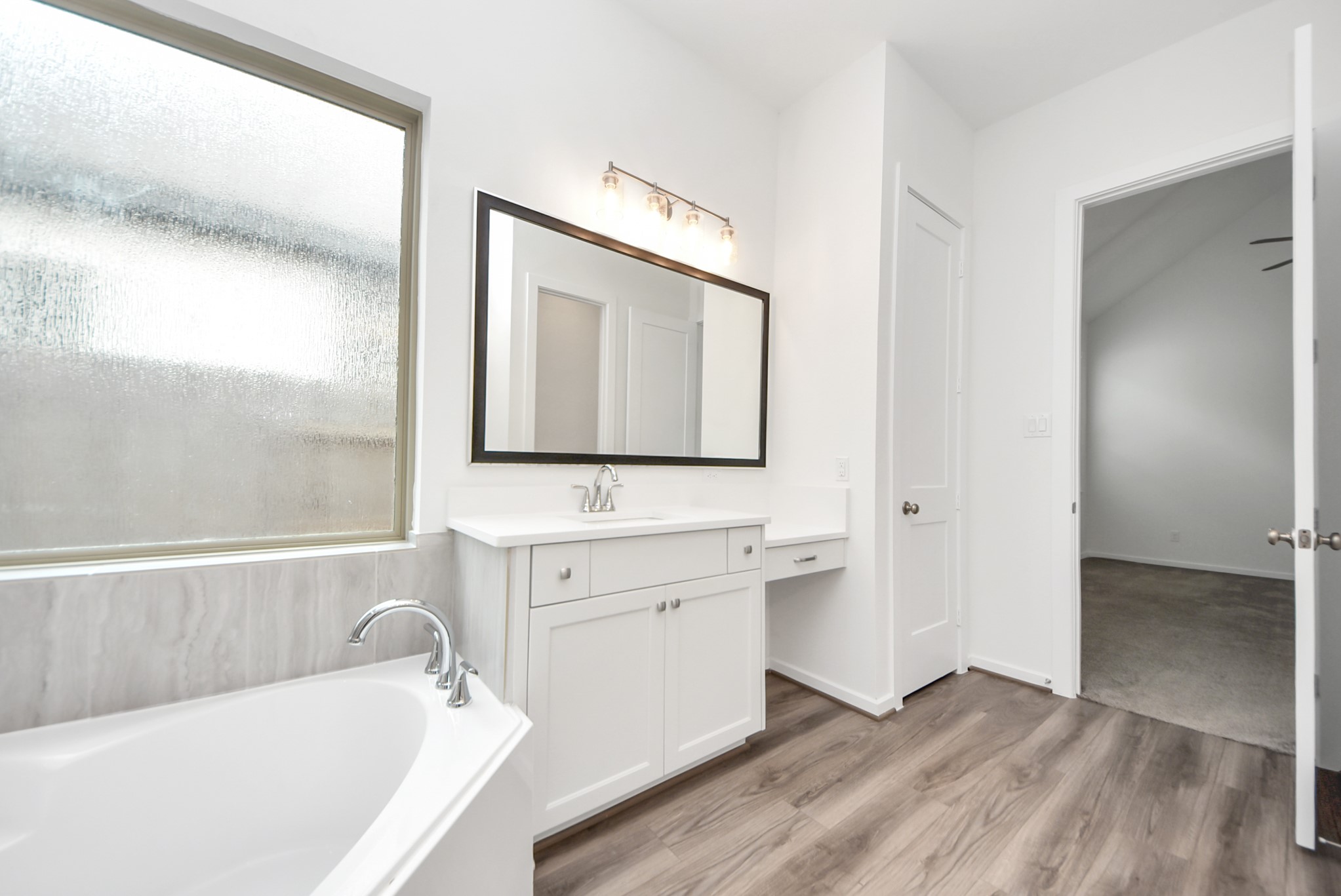 Primary bathroom her sink with vanity