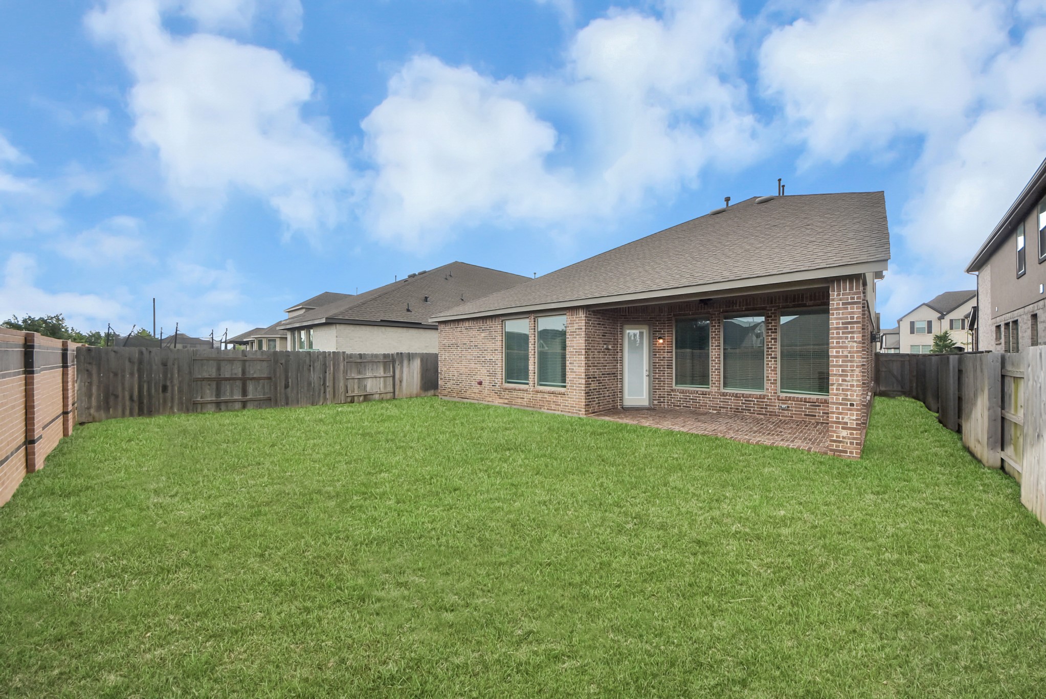 Covered patio and backyard