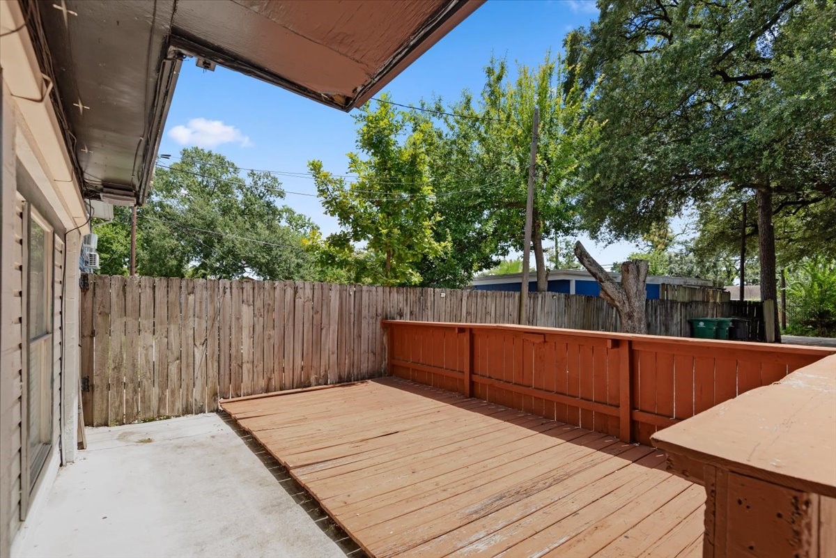 Private enclosed courtyard with wood deck. Private enclosed courtyard with wood deck.