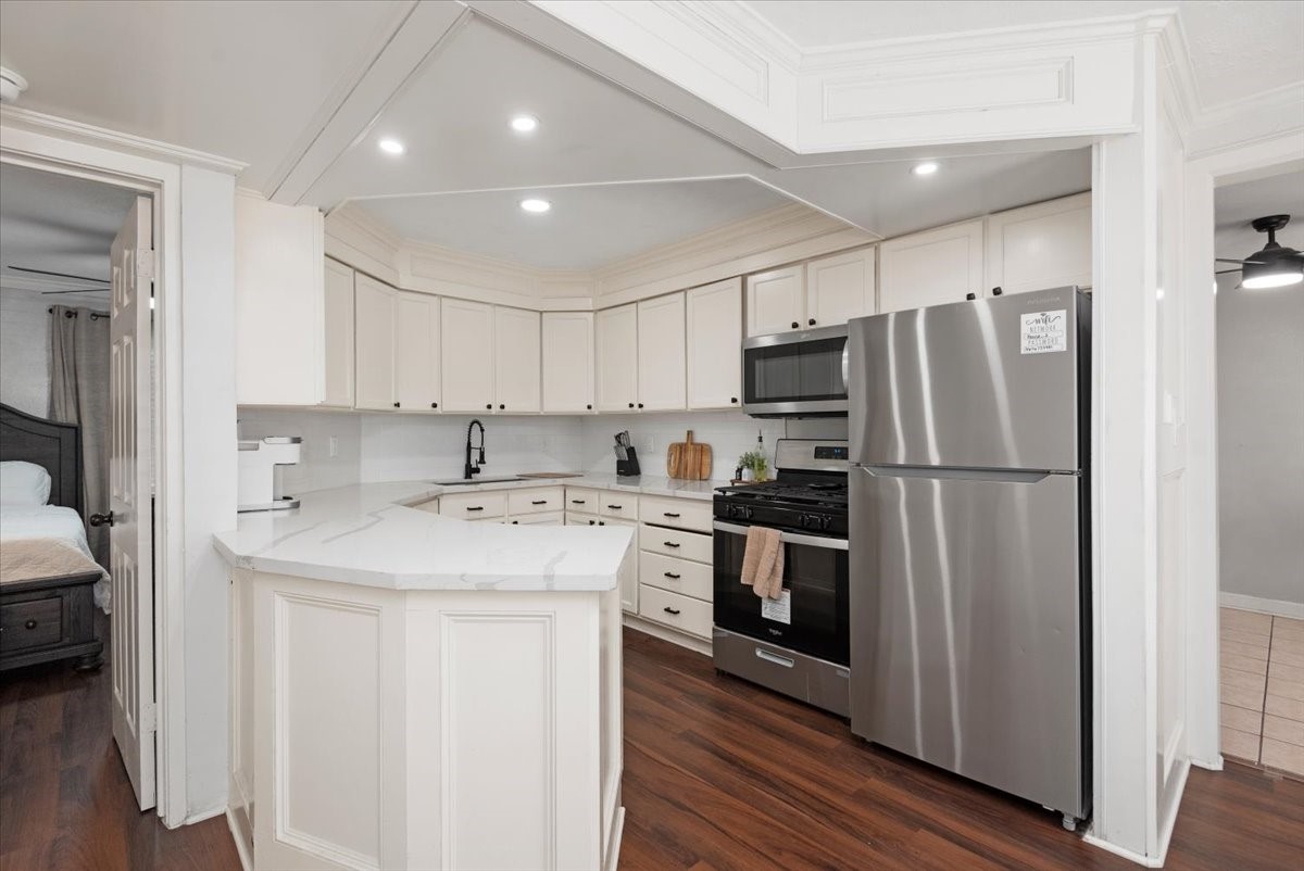 Downstairs Kitchen with ample cabinet and counter space. Downstairs Kitchen with ample cabinet and counter space.