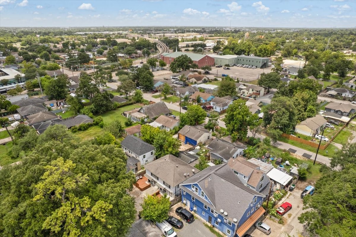 Aerial view of the property and surrounding neighborhood.