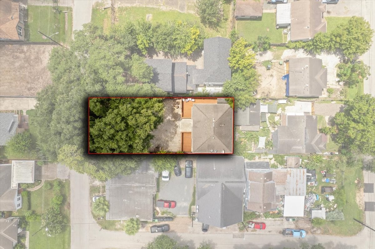 Overhead aerial view of the property and lot.