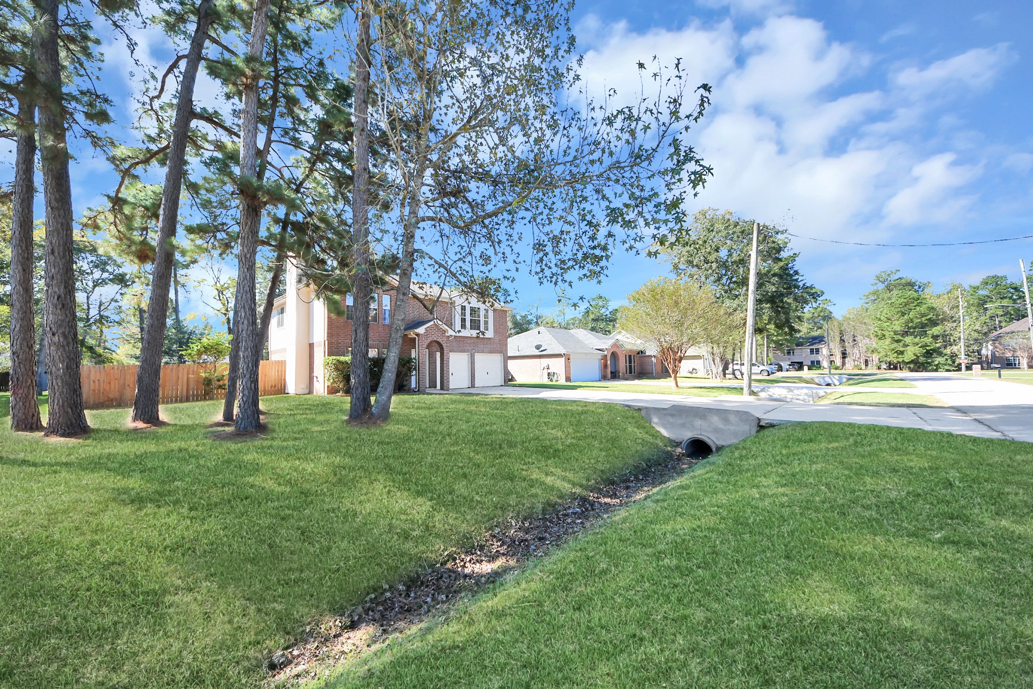 Spacious lot, fully fenced backyard, long driveway for extra room!