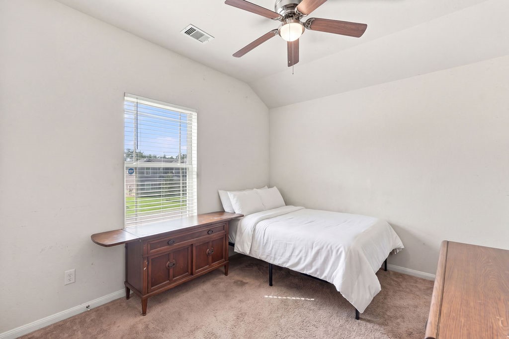 Third bedroom upstairs (virtually staged).