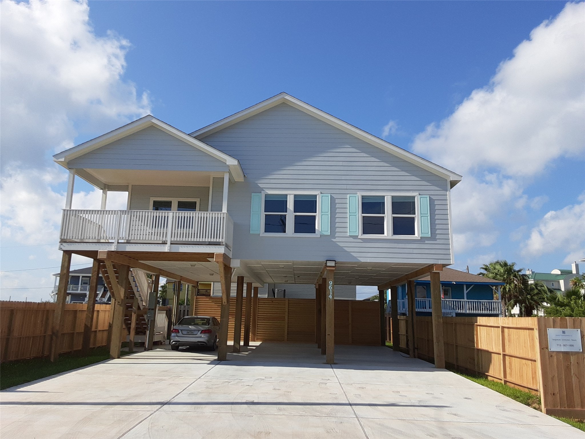 This home has a welcoming entrance with plenty of room for guest to park when entertaining friends and family in this beautiful home.  There is an abundance of shaded space under the home to possibly make an outdoor kitchen and lounge area to relax and enjoy the water views.