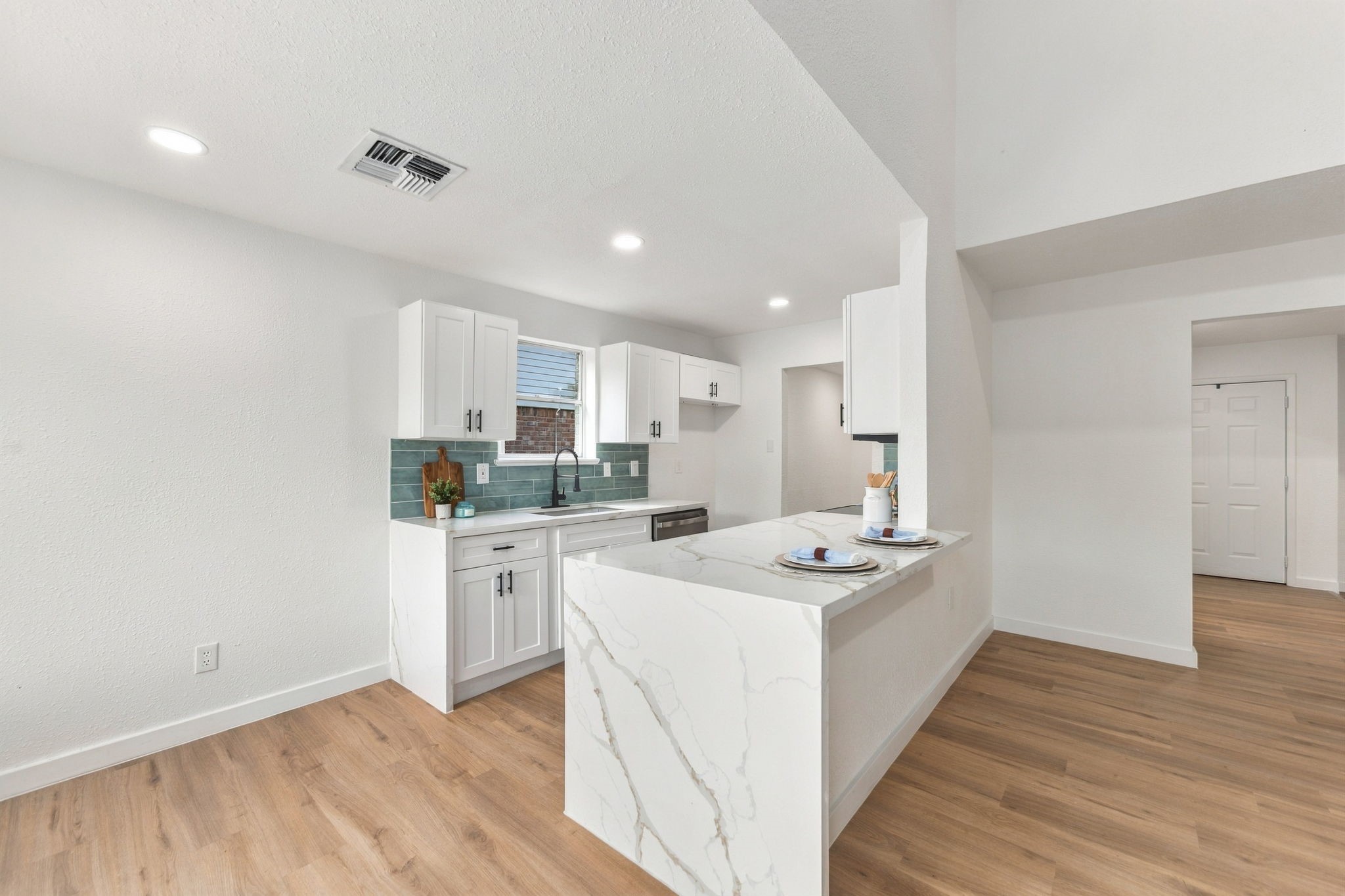 Beautifully remodeled kitchen with generous counter space and modern finishes.