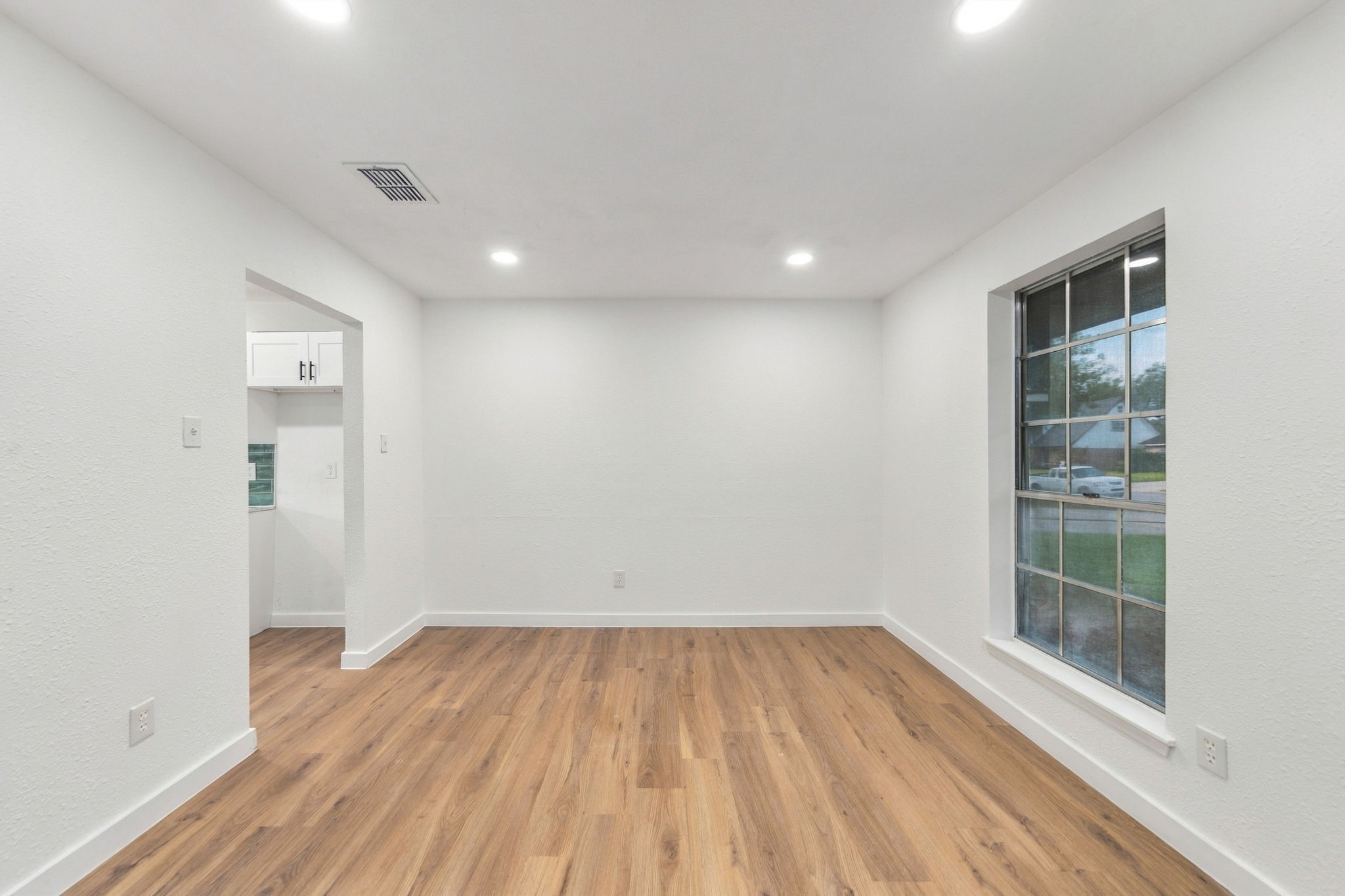 Dedicated dining area with updated finishes and abundant natural light.