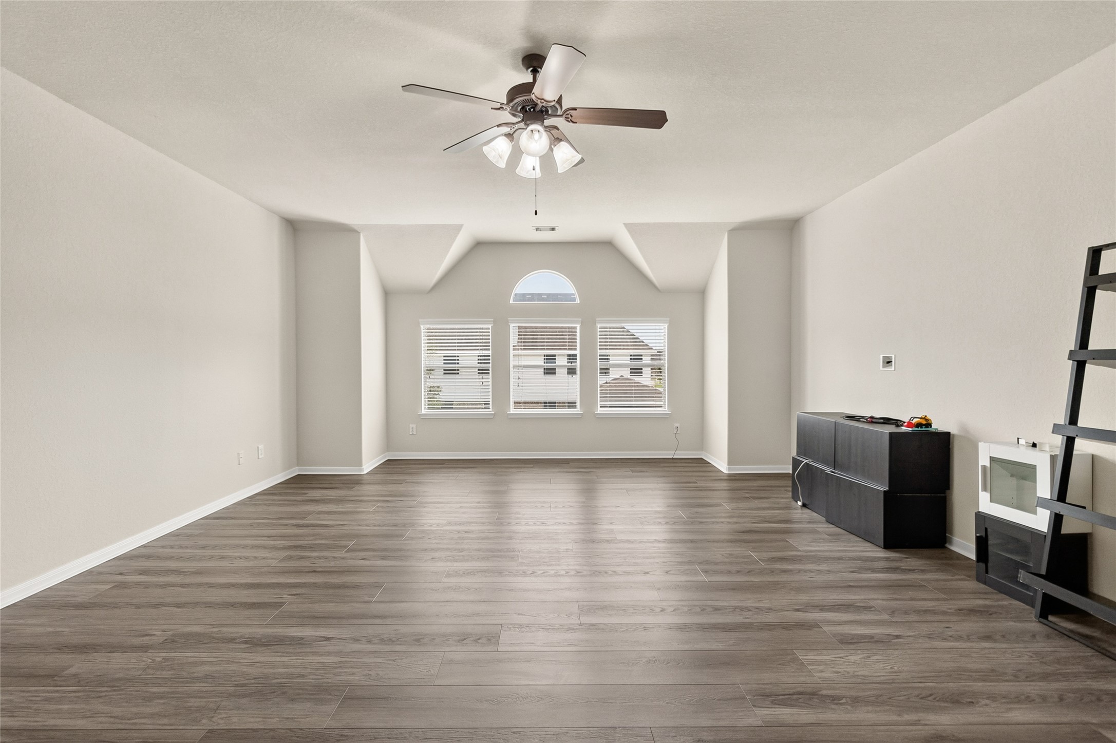 Your expansive upstairs game room offers endless flexibility for a media room, game nights, a home gym, or the ultimate entertainment space.