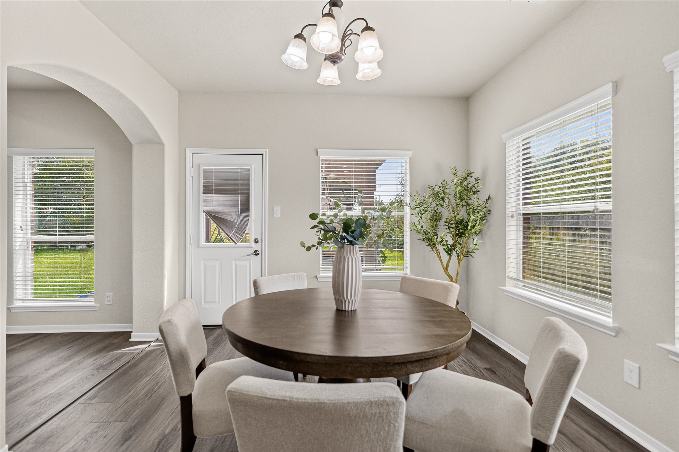 Morning coffee feels even better in the bright breakfast nook, where backyard views and natural light create the perfect start to your day.