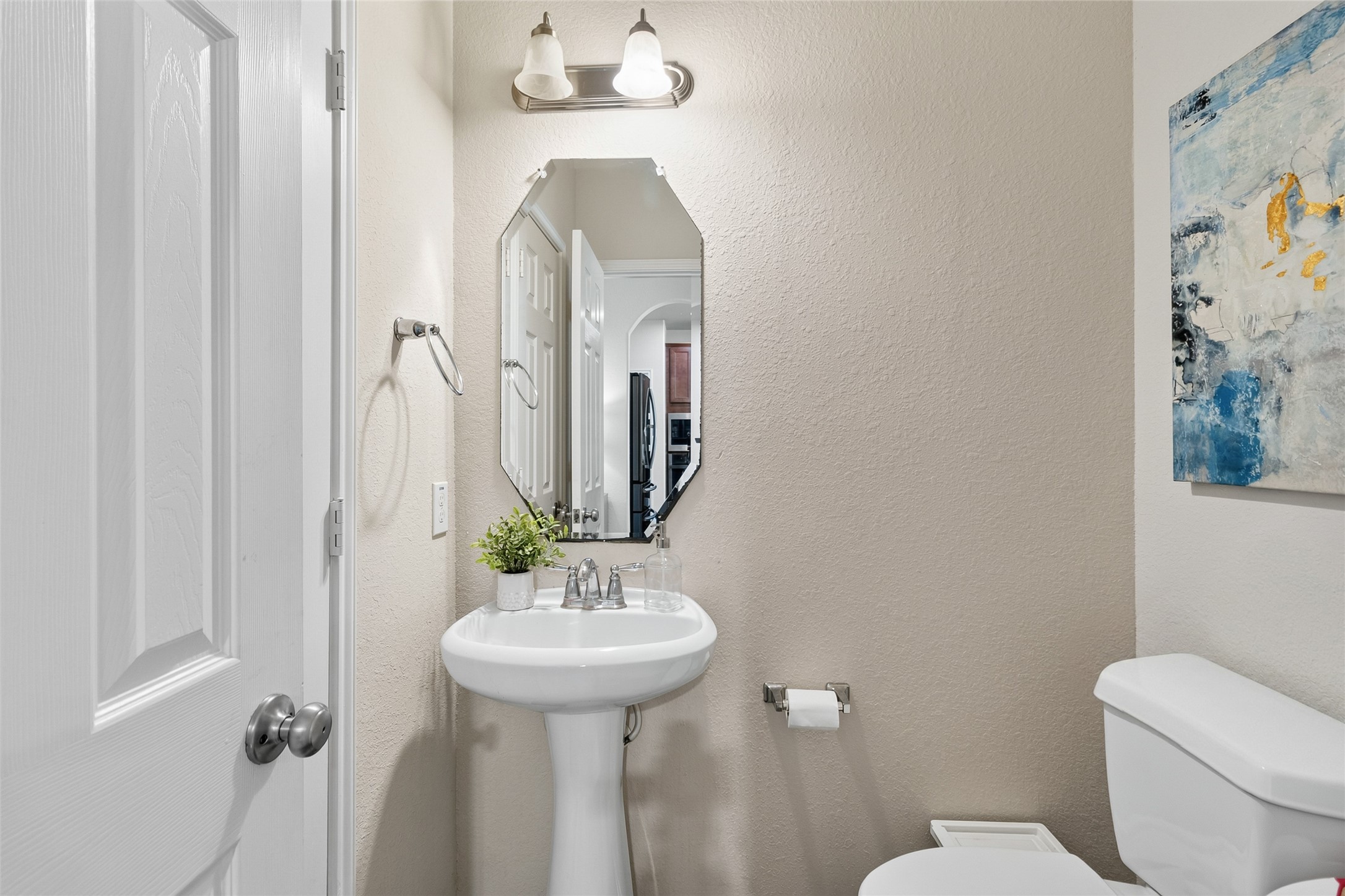 Your convenient first-floor powder bath gives guests a stylish and easily accessible space without disrupting the rest of your home.