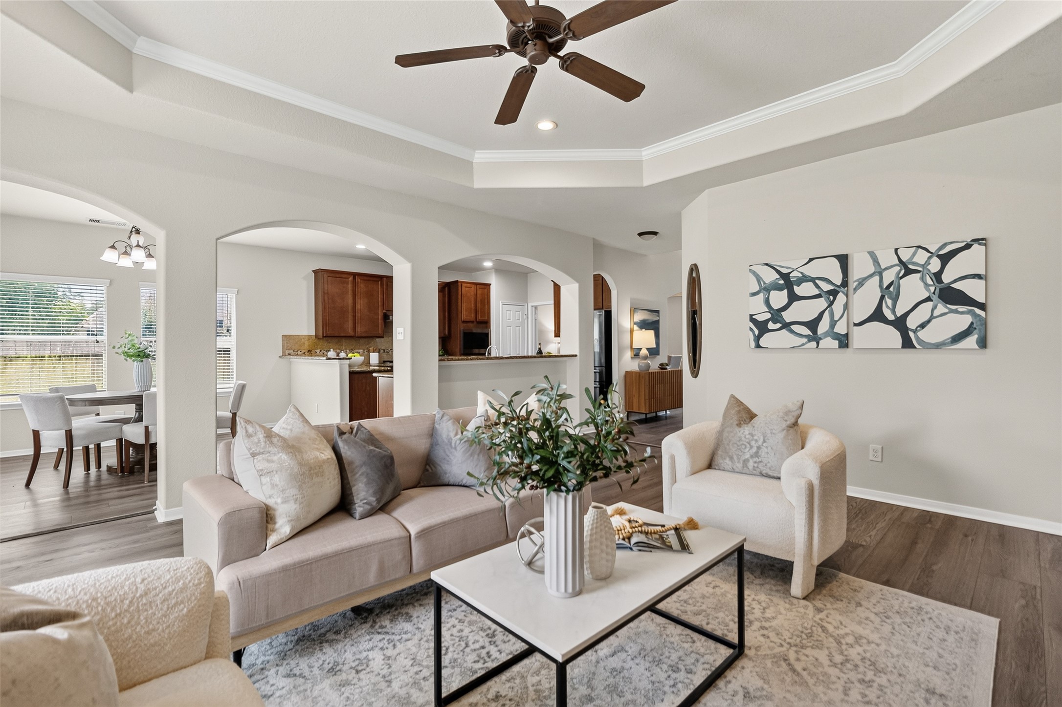 Your open layout keeps everyone connected, allowing conversations to flow easily between the family room, kitchen, and breakfast area.