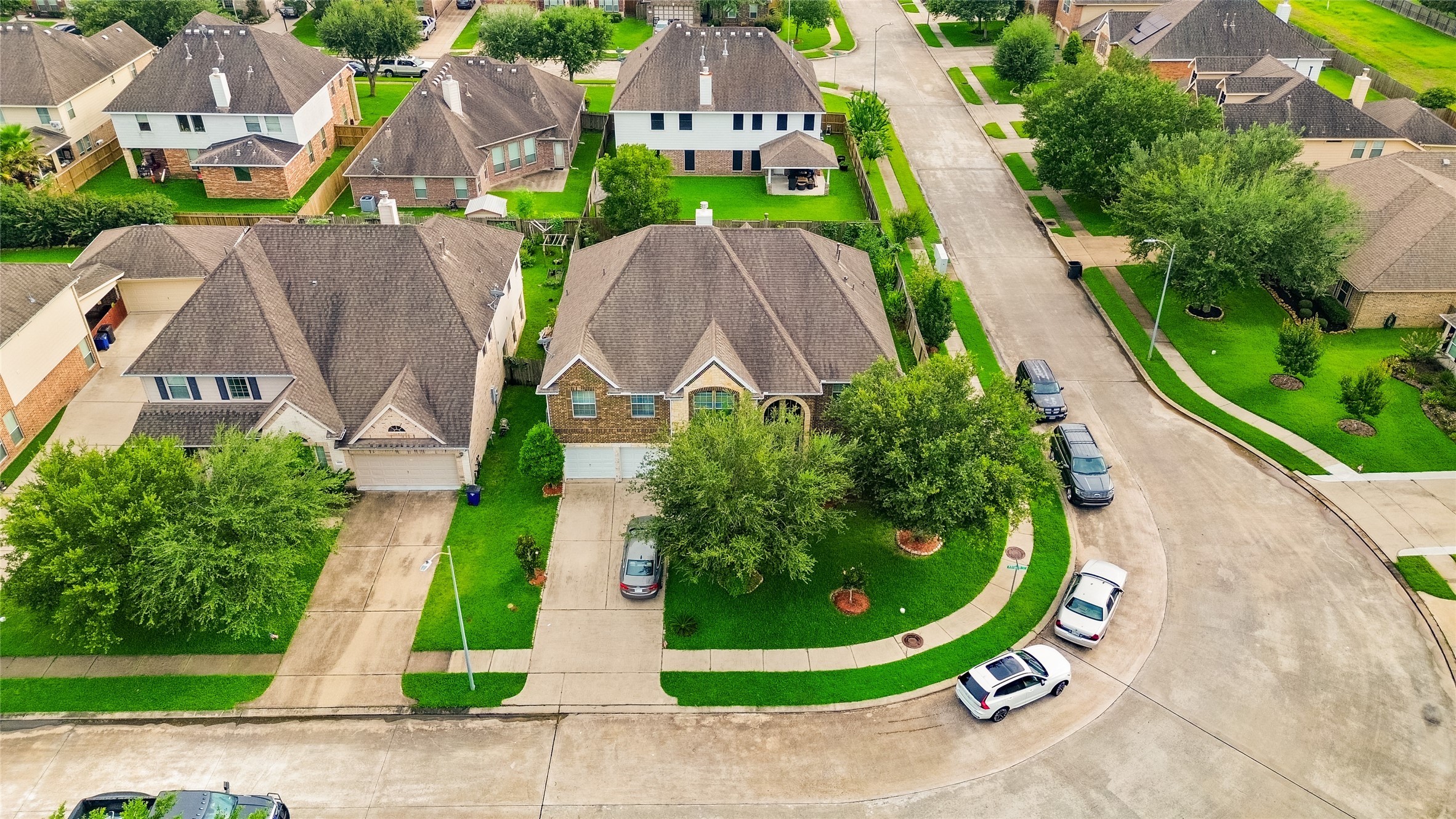 Coming home feels even better with a corner lot that offers extra space, mature trees, and beautiful curb appeal.