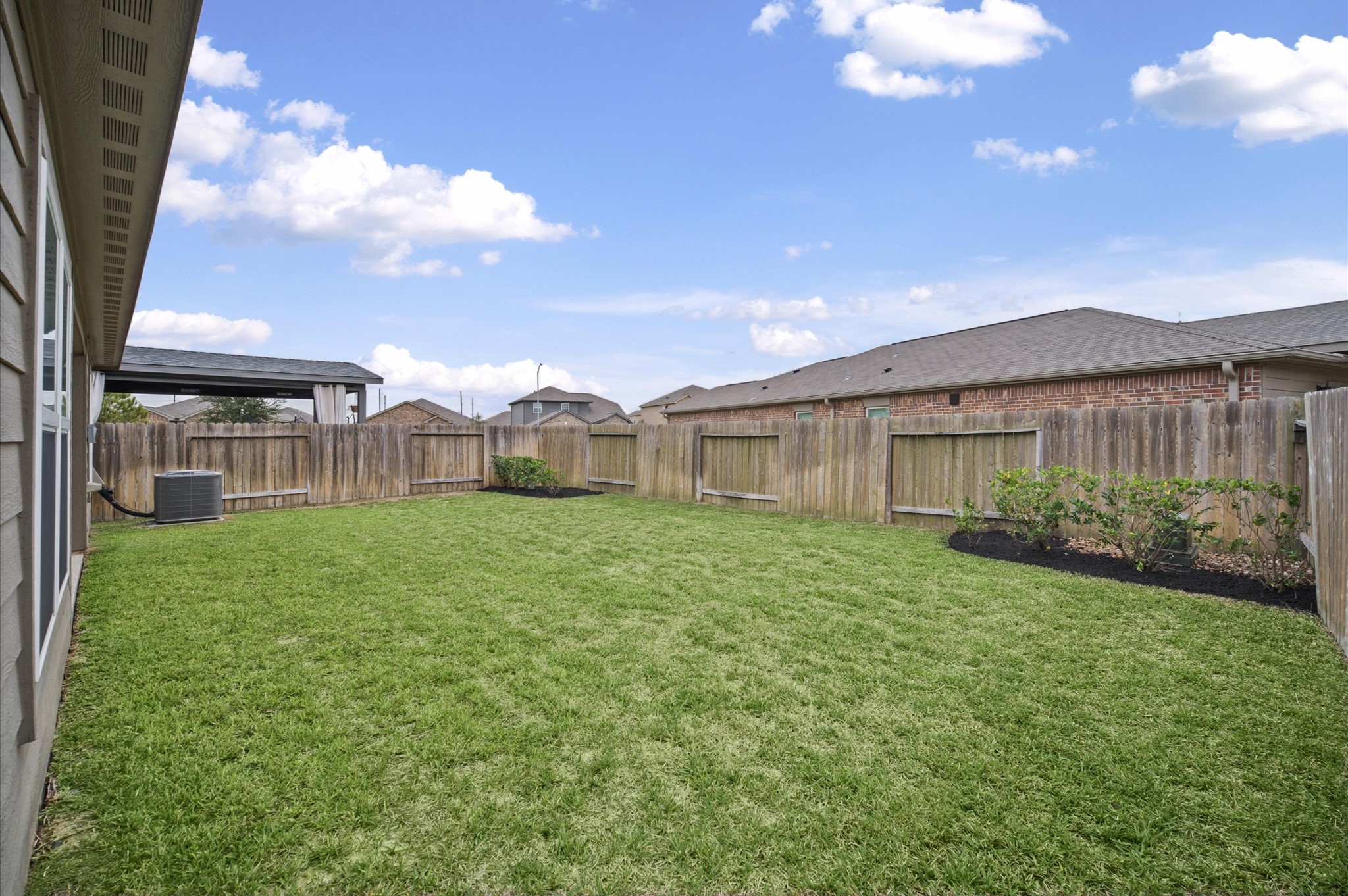 Large backyard with easy maintenance.
