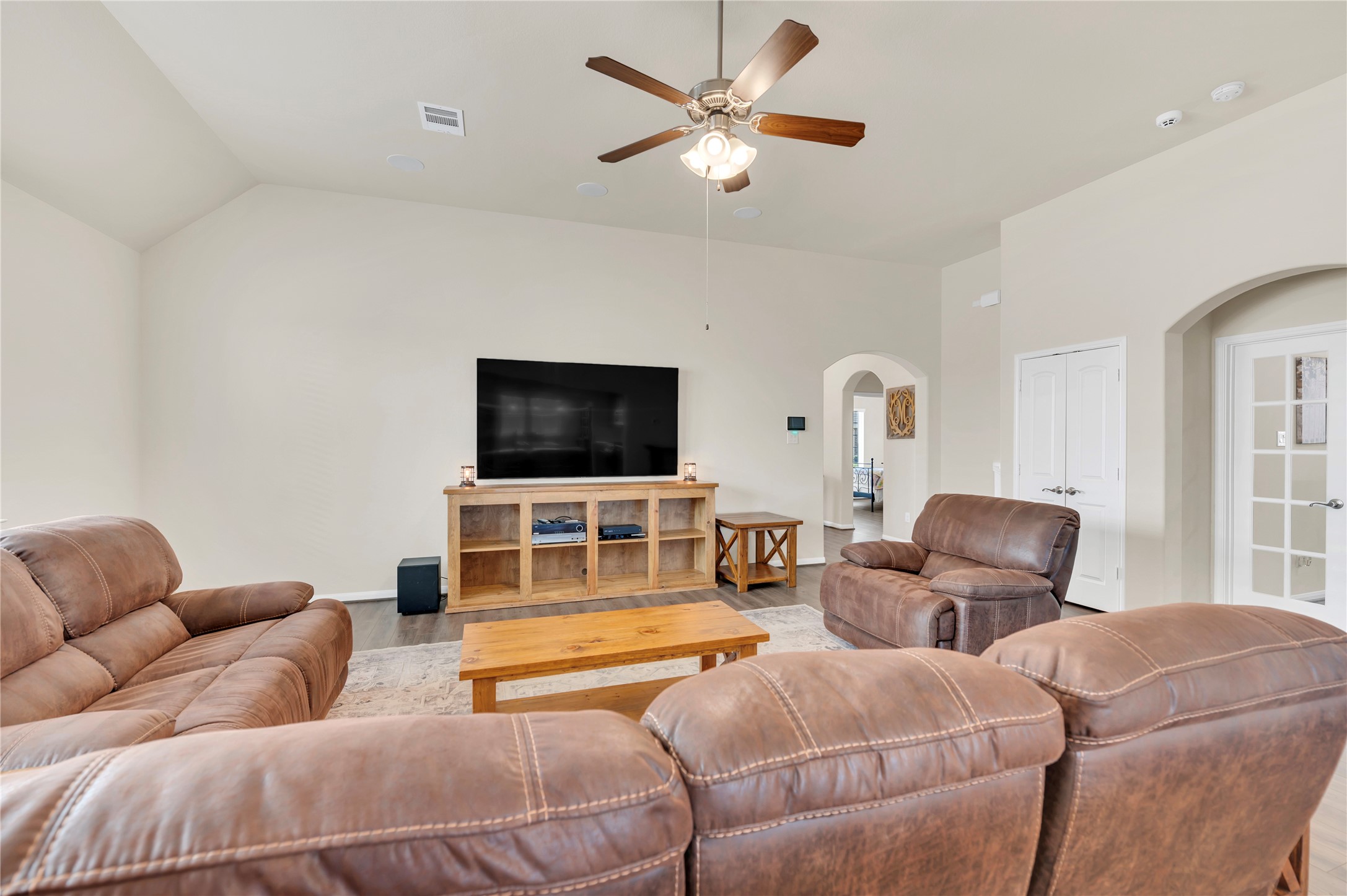The spacious living room is pre wired with a 5.1 surround sound system installed.