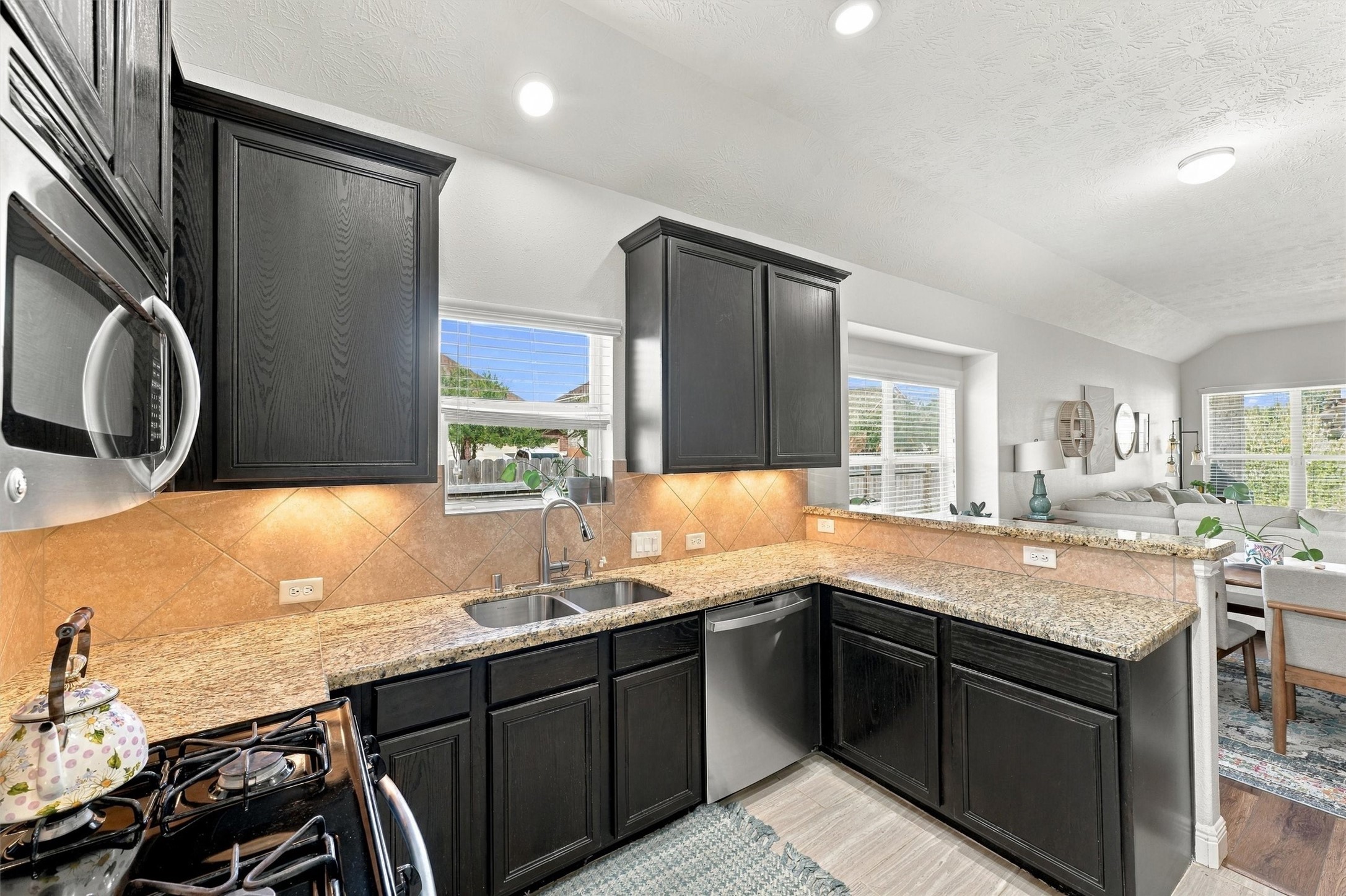 Under cabinet lighting and window over the sink