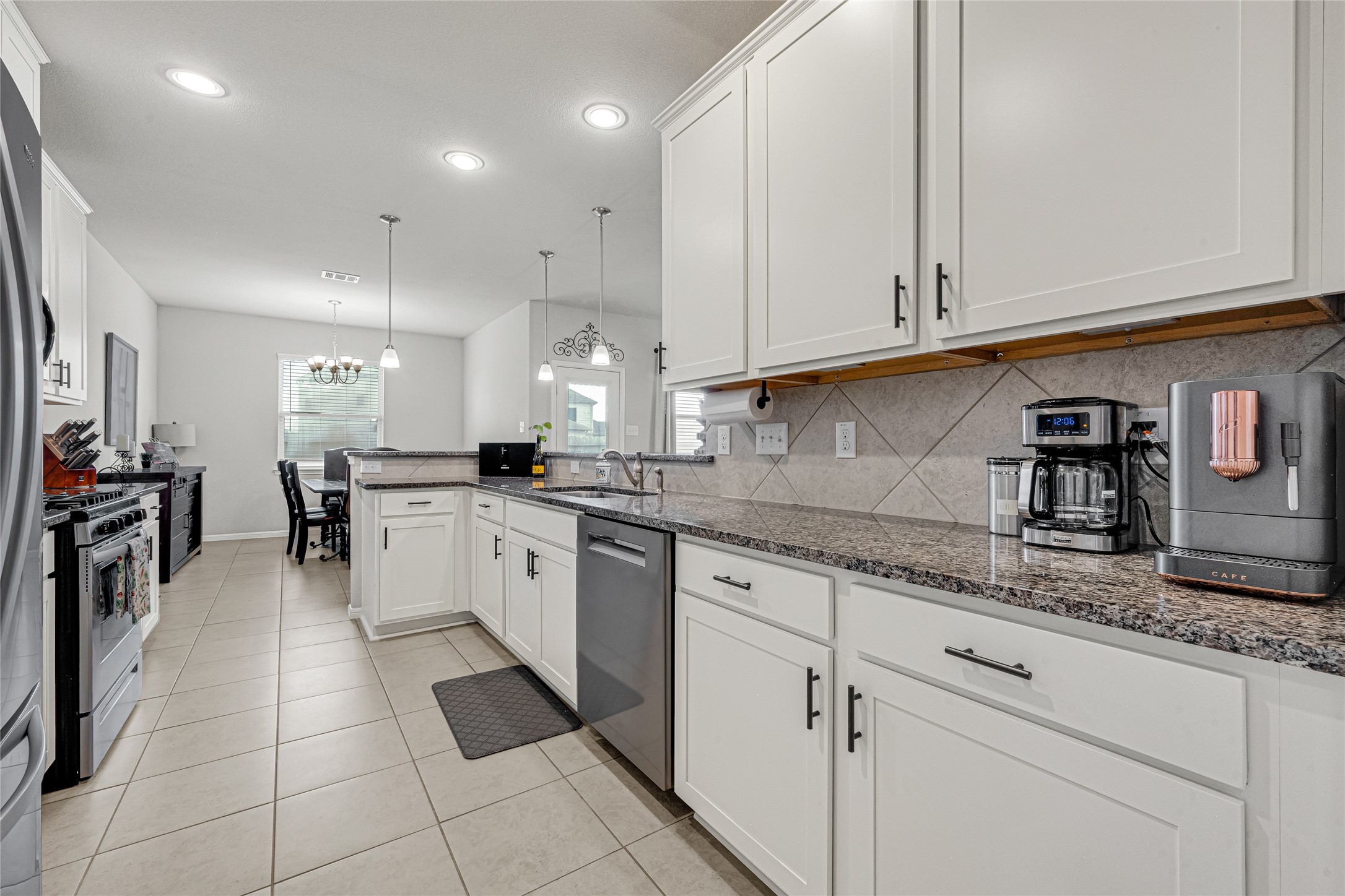 Chef-inspired kitchen offering abundant counter space and storage.