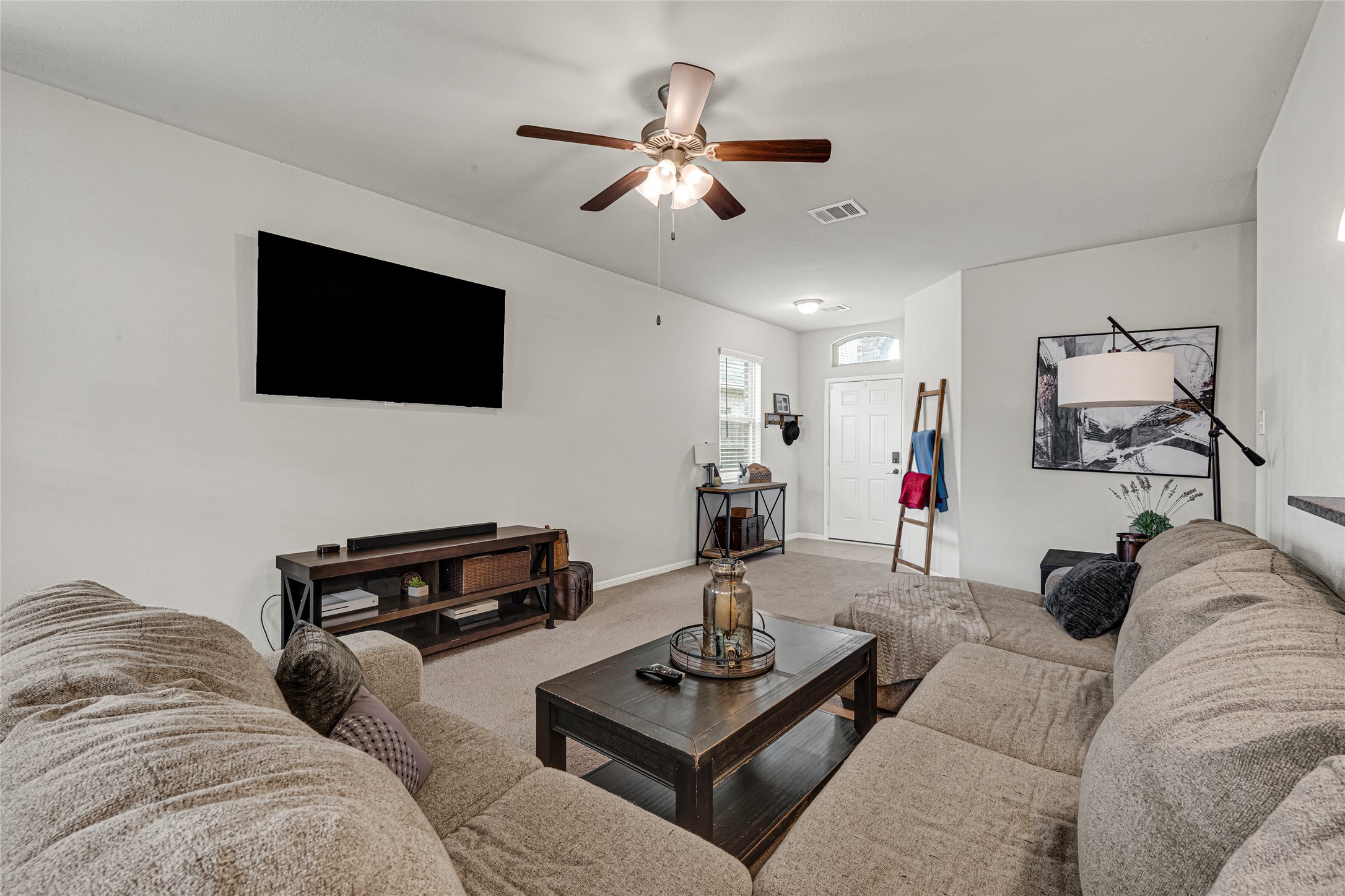 Spacious family room perfect for relaxing or gathering with friends and family. Spacious family room perfect for relaxing or gathering with friends and family.
