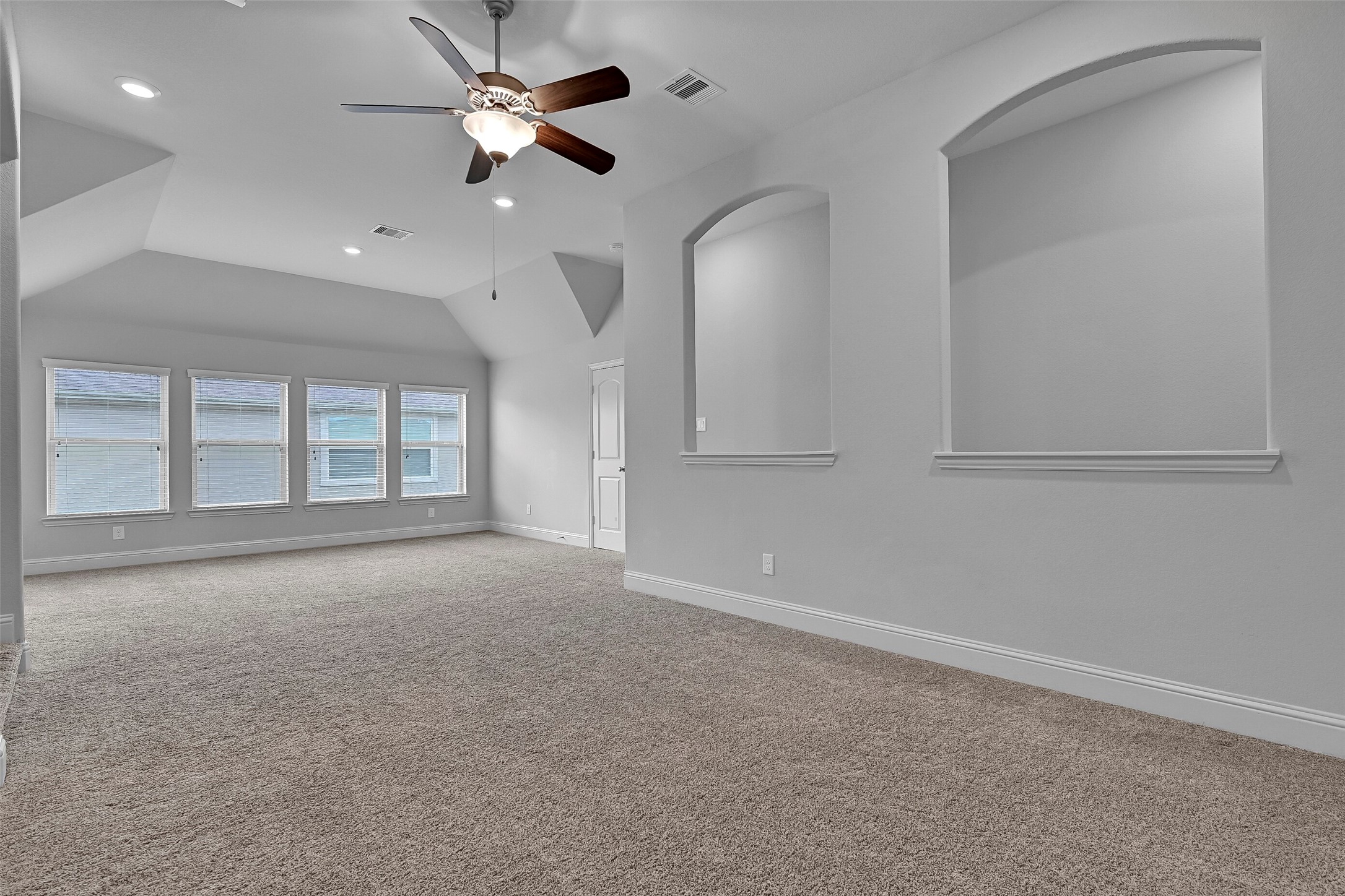 One of the most unique features of this Village Builders design is the dedicated second level, where a sprawling game room creates the ultimate retreat. With all four bedrooms located downstairs, the upper level is reserved for recreation and includes a game room, media room, and full bath.