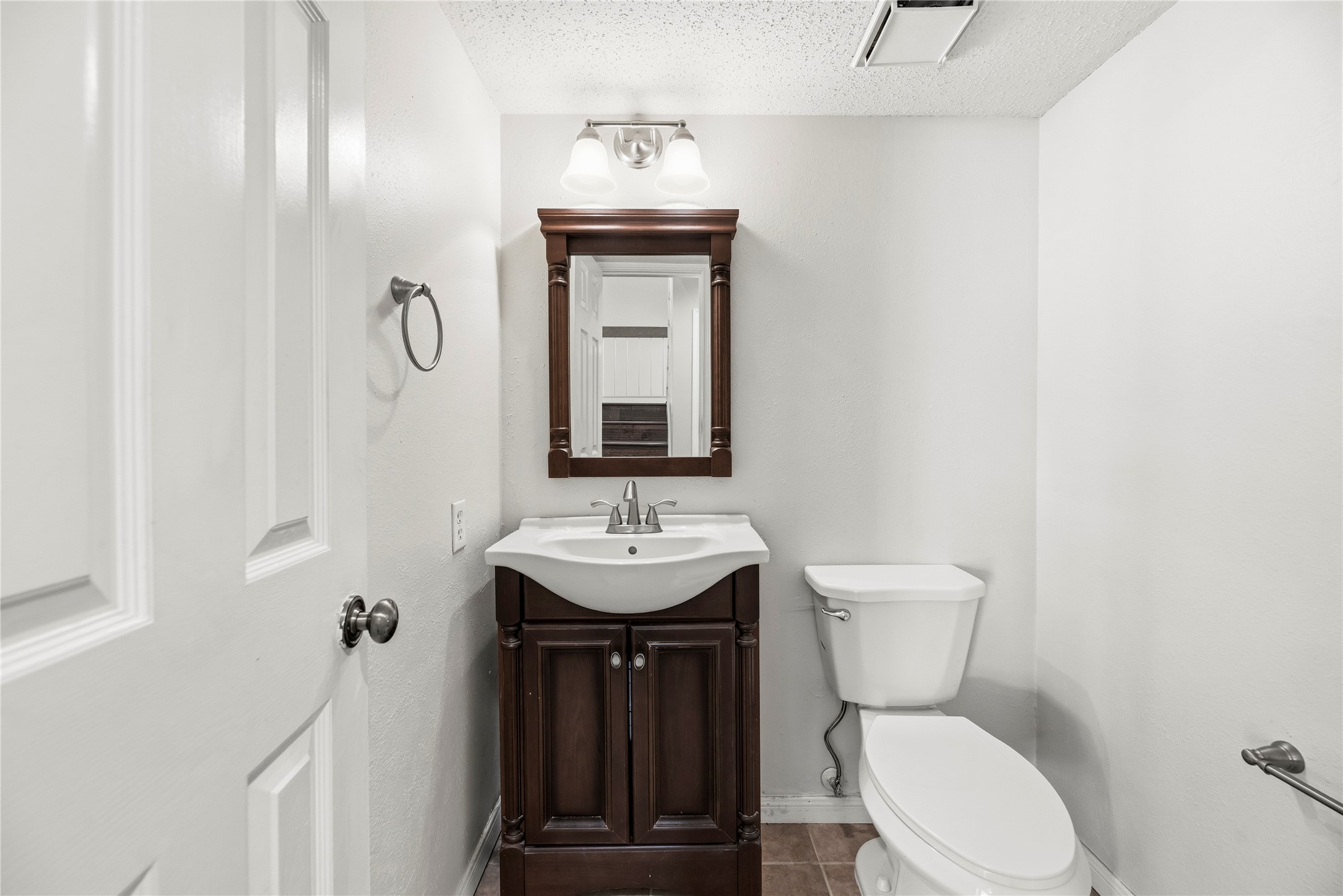 Downstairs half bathroom.