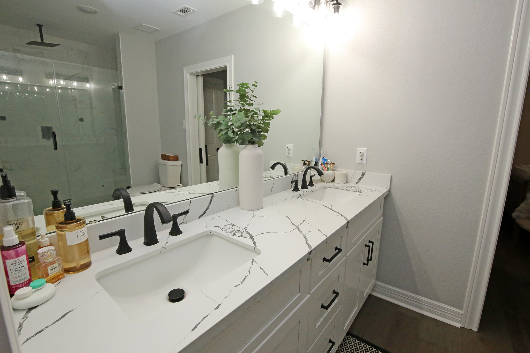 Double Sinks in the bathroom with Quartz countertops