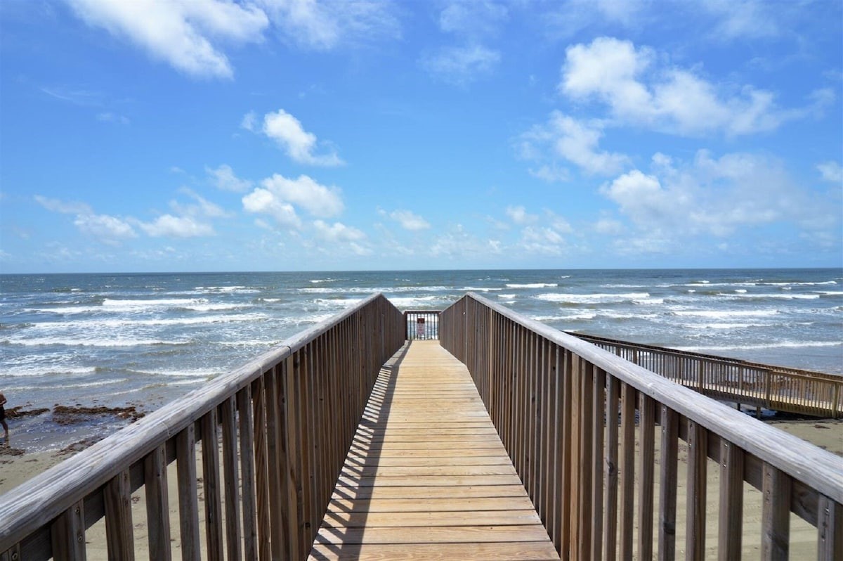Walk straight onto the beach from the complex without crossing the busy road