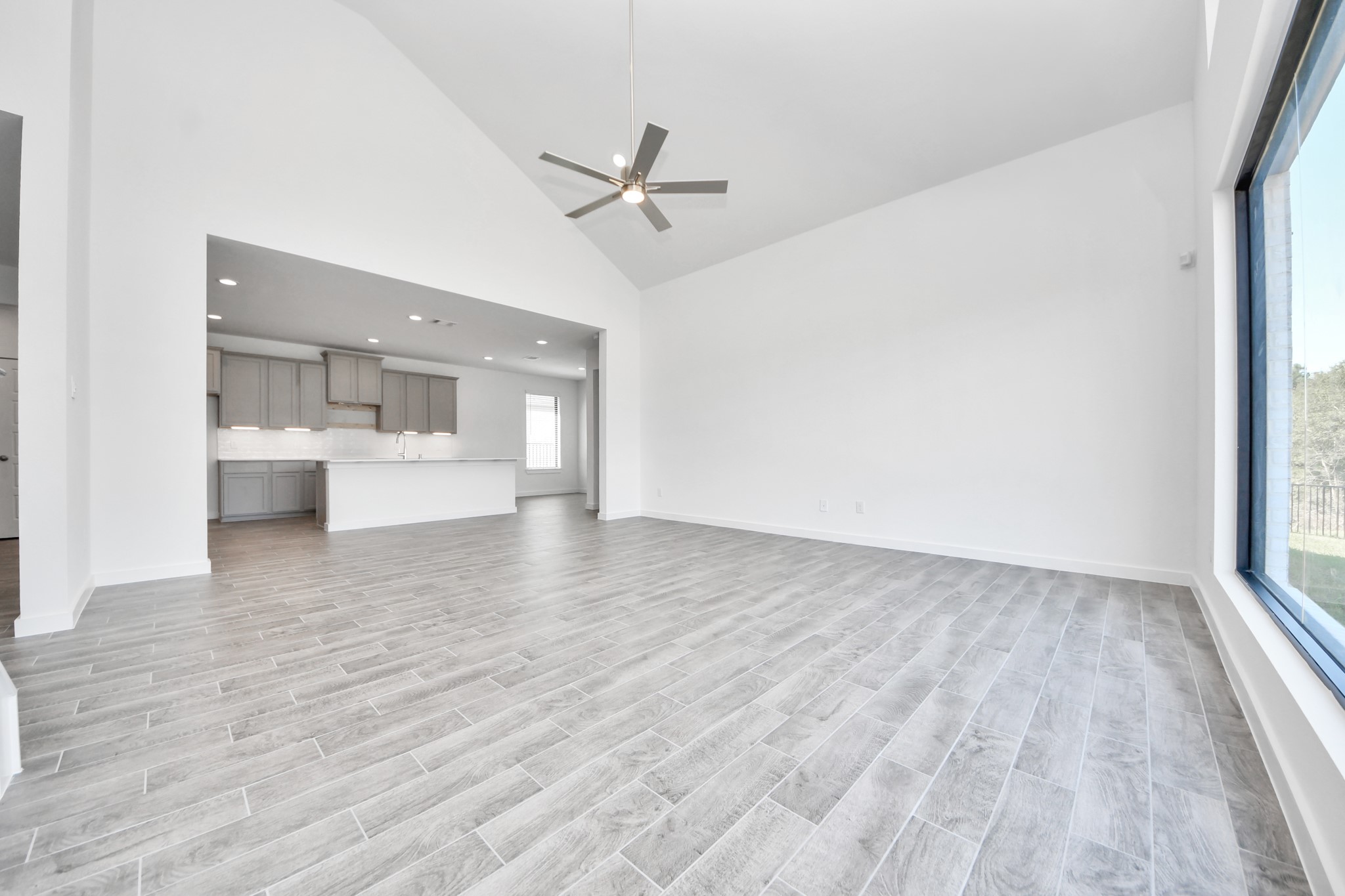 Take another glimpse into the heart of the home with this additional view of the family rooma sprawling space ready to accommodate all your gatherings.