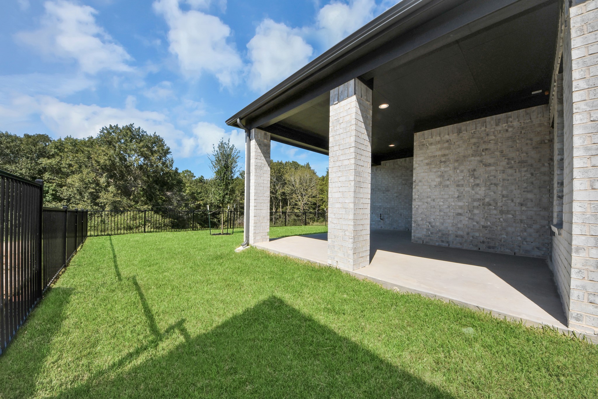 Come and see this spacious backyard with its beautiful covered patio. There is plenty of room for the kids to play and adults to relax. Perfect for your outdoor living space, patio furniture, bbq pit, and so much more. The possibilities are endless!