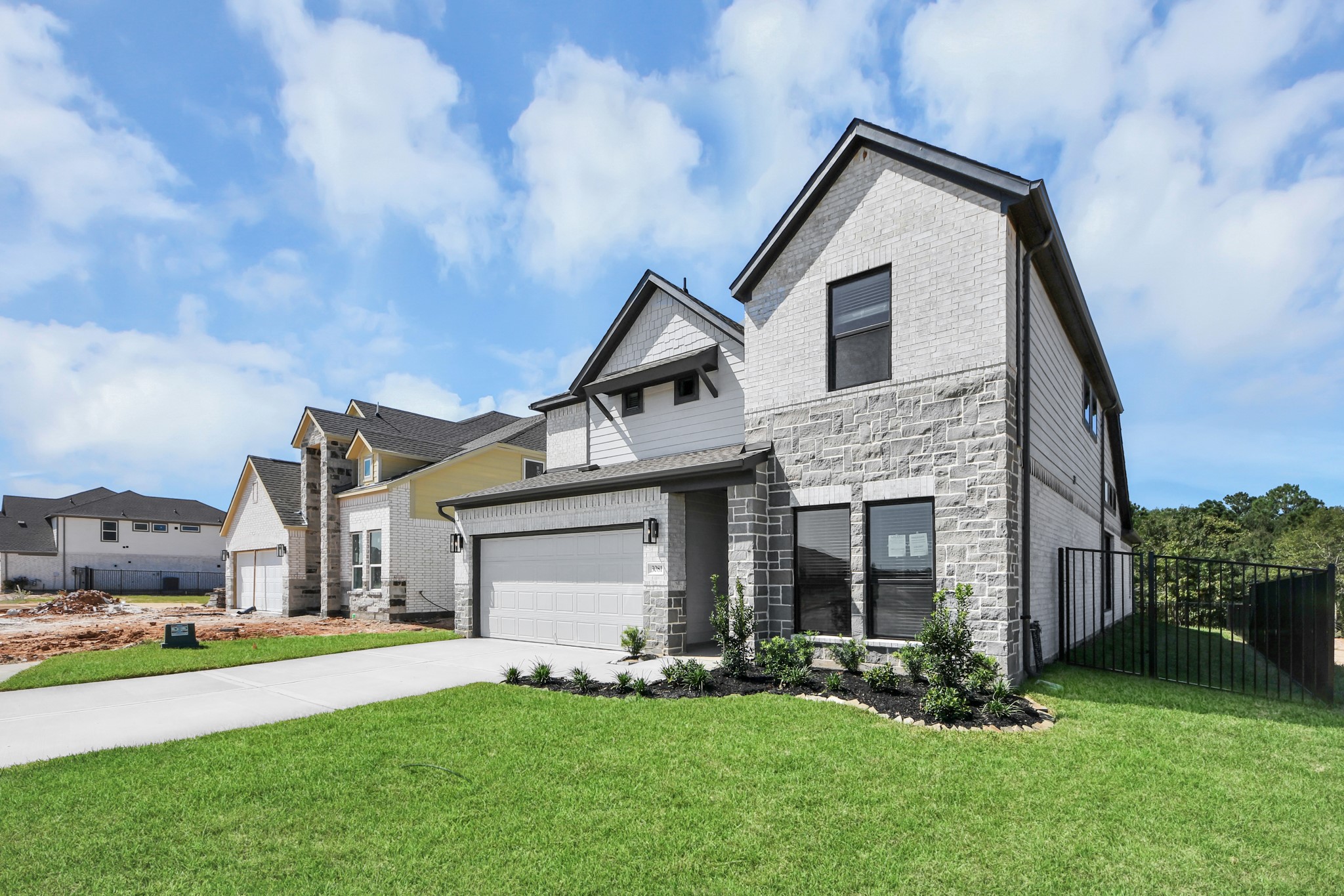 Home features a convenient 2-car garage complemented by a spacious driveway, offering ample parking for you and your guests. Home features a convenient 2-car garage complemented by a spacious driveway, offering ample parking for you and your guests.