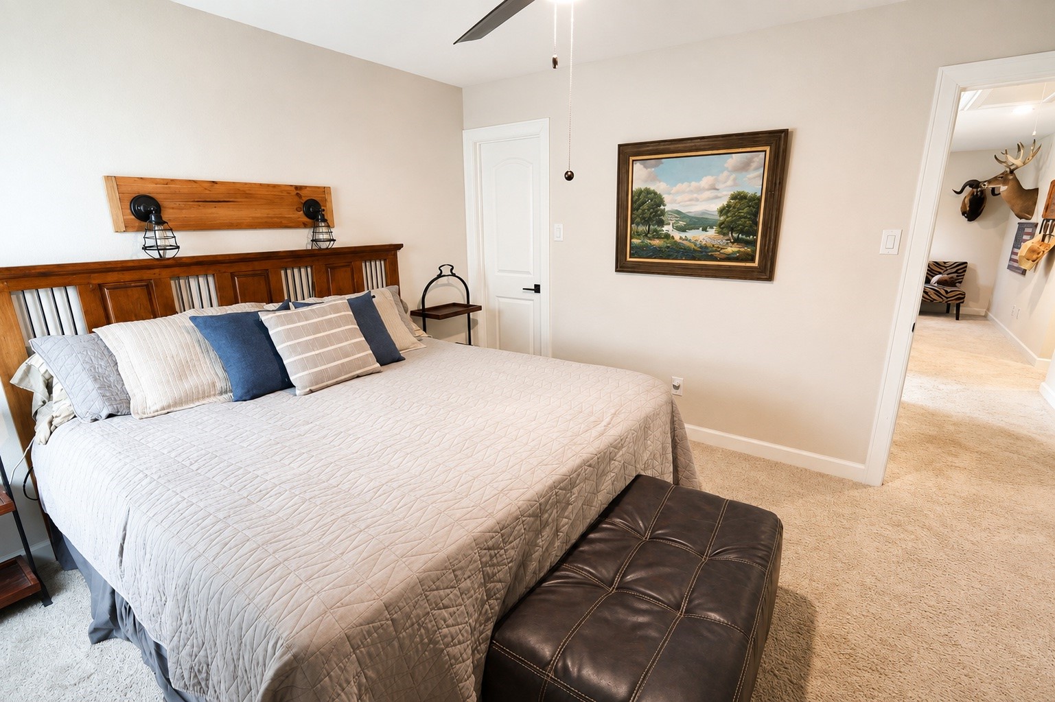 Large secondary bedroom that fits a king size bed as seen in photo.
