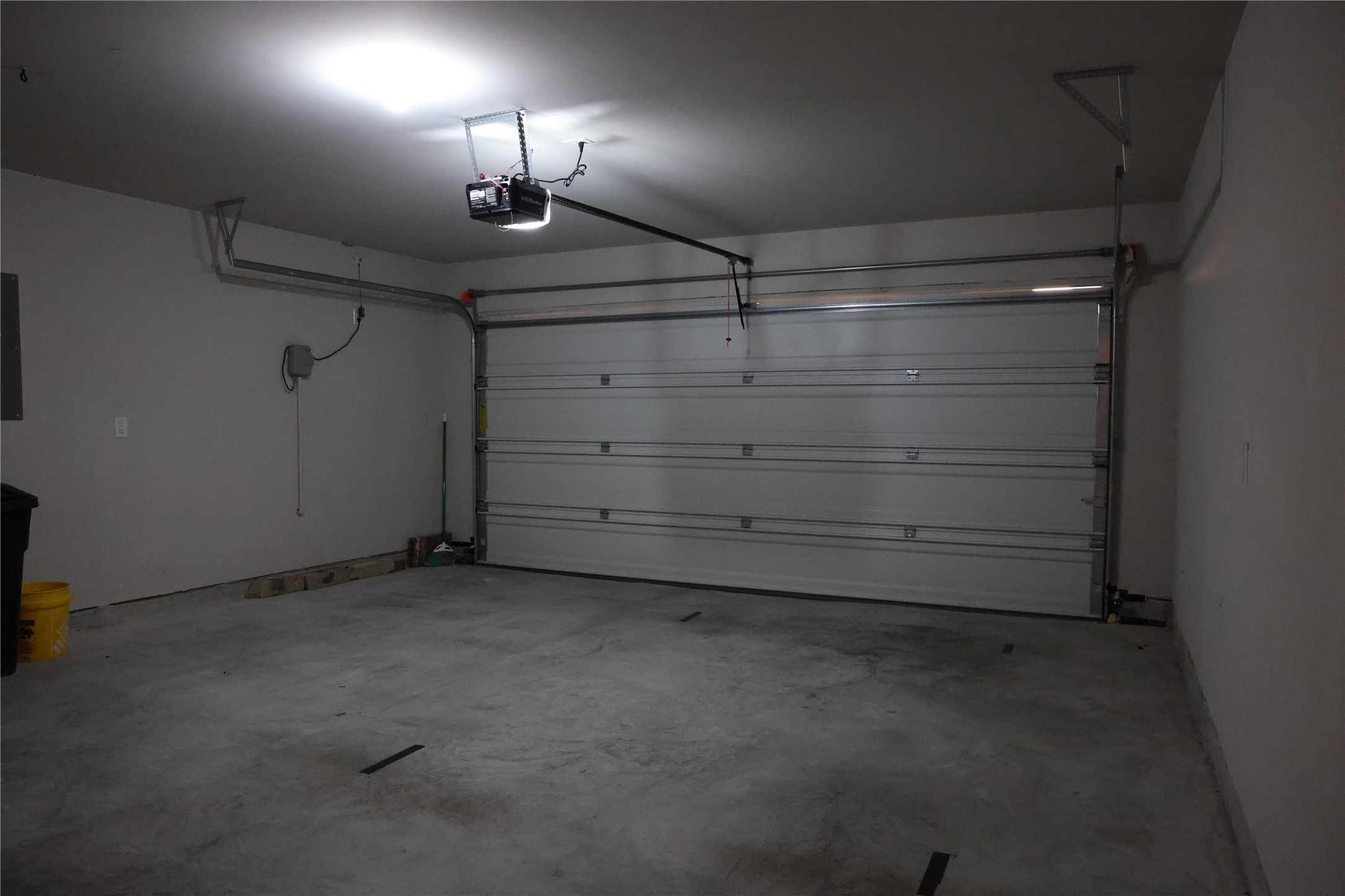 Spacious two-car garage offering ample room for vehicles and storage