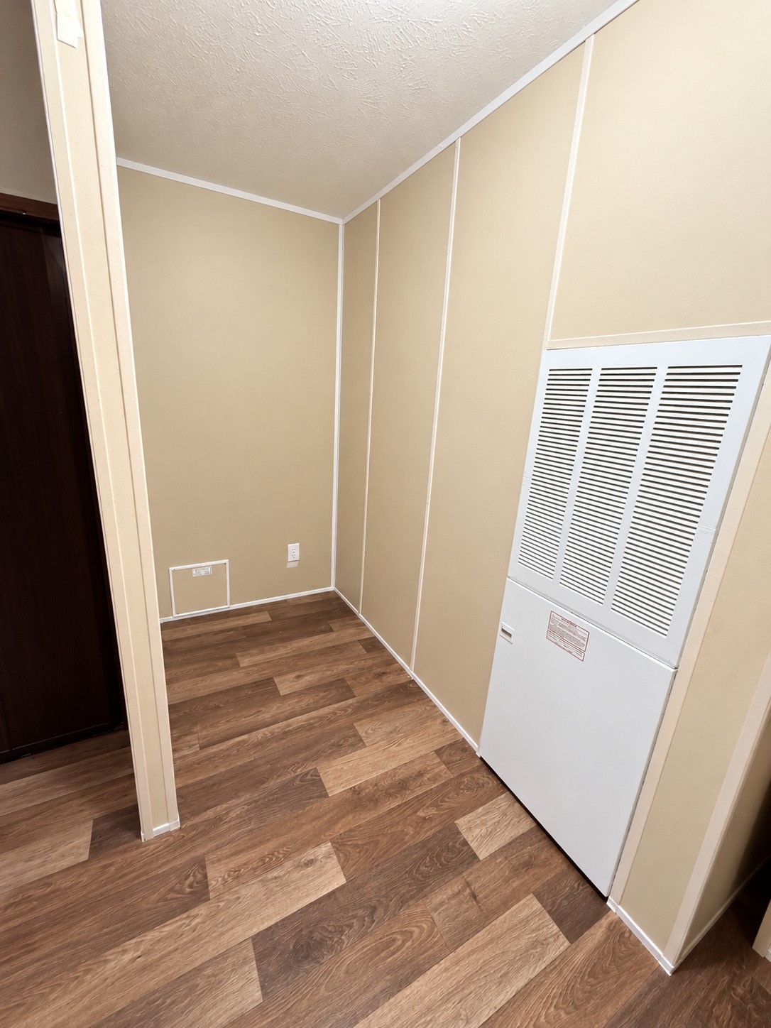 Utility Room space perfect for small deep freezer, extra refrigerator, or storage space Utility Room space perfect for small deep freezer, extra refrigerator, or storage space