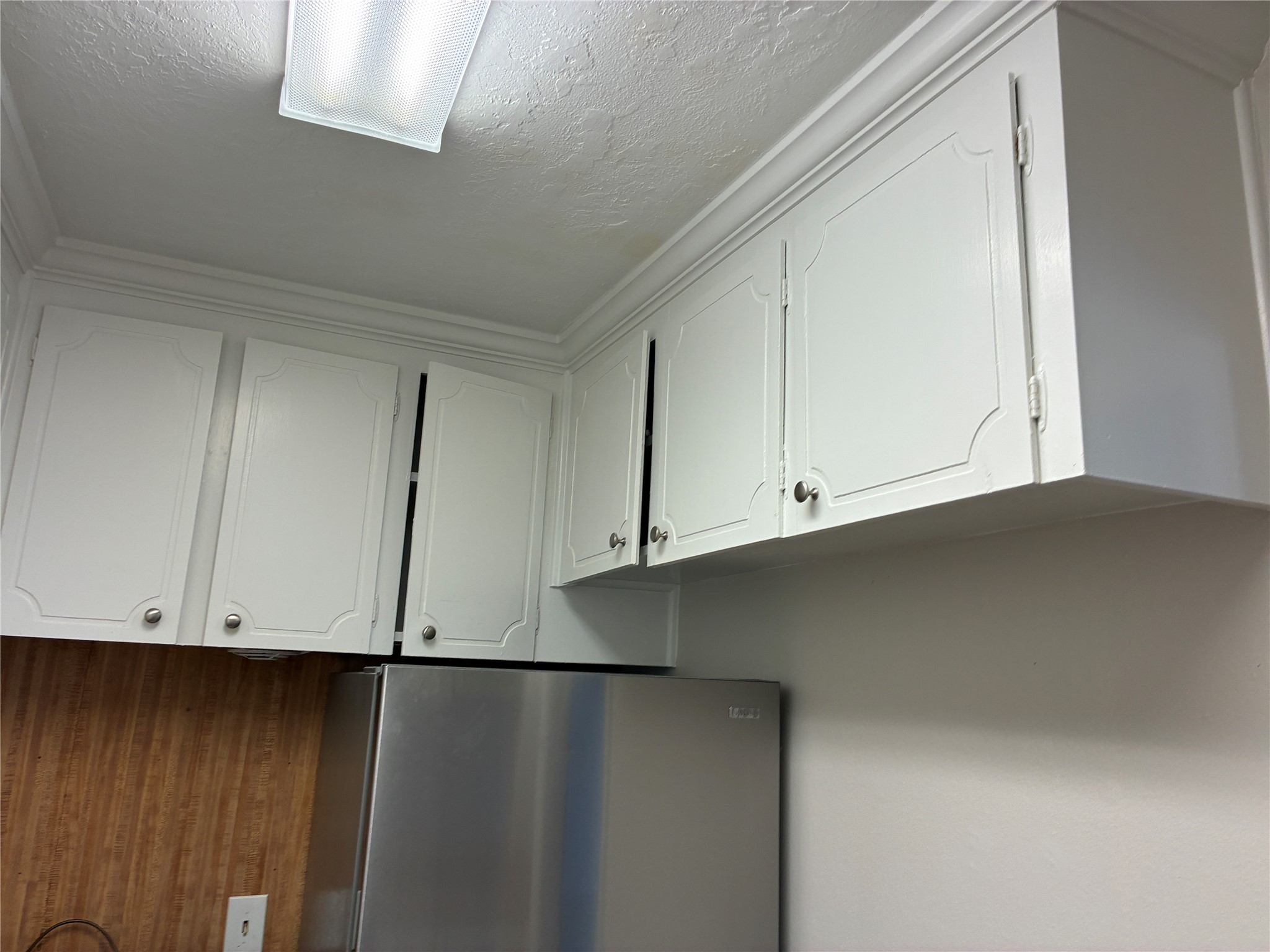 Lots of cabinets in kitchen