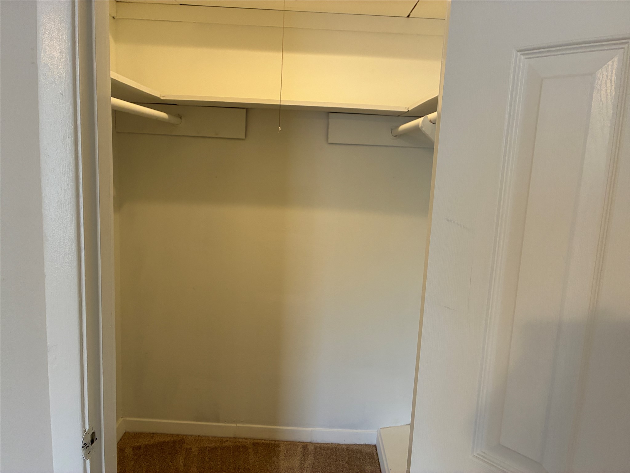 Primary Bedroom walkin closet