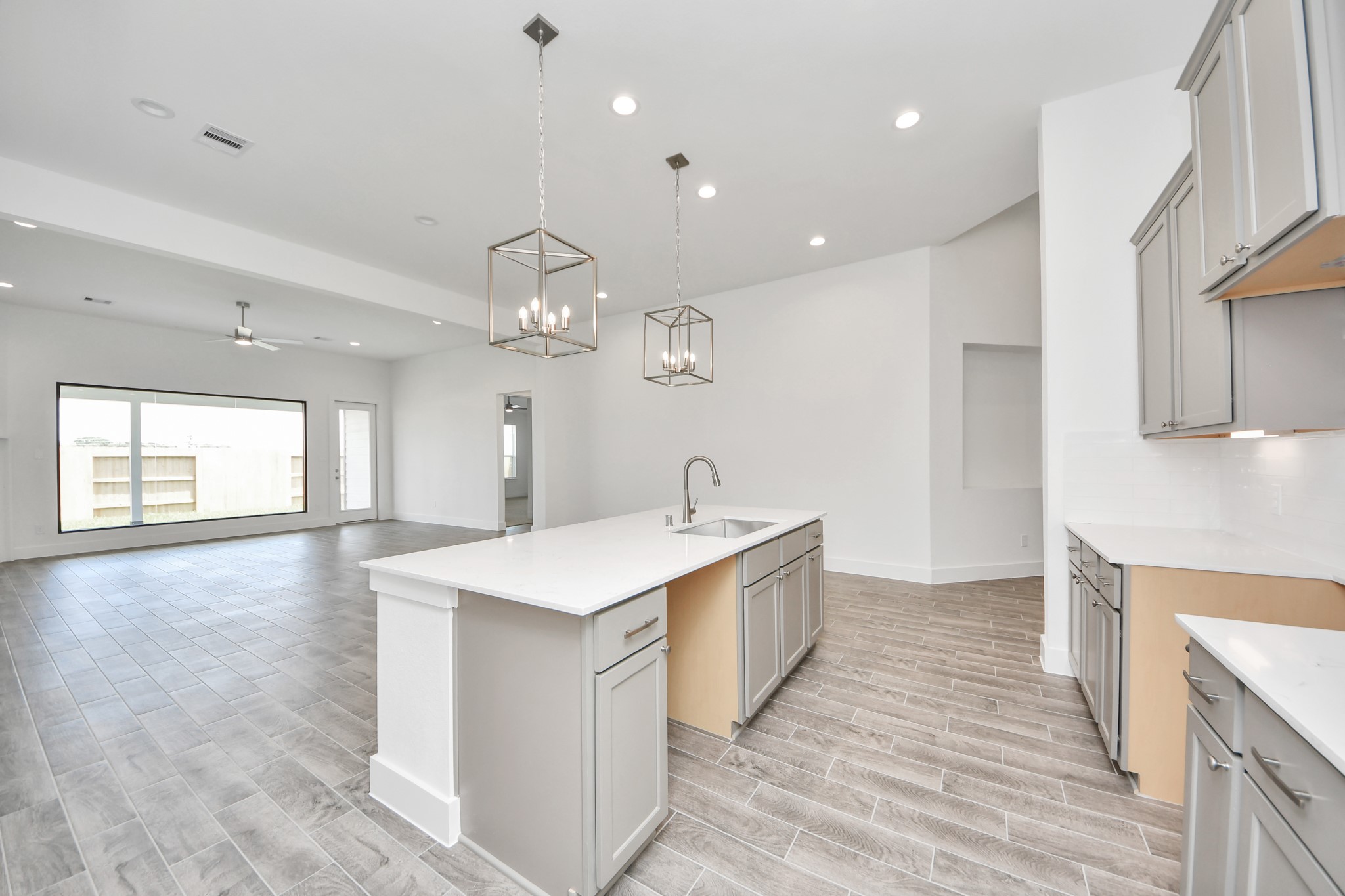 This generously spacious kitchen is a dream realized! Sample photo of completed home with similar floor plan. Actual colors and selections may vary.